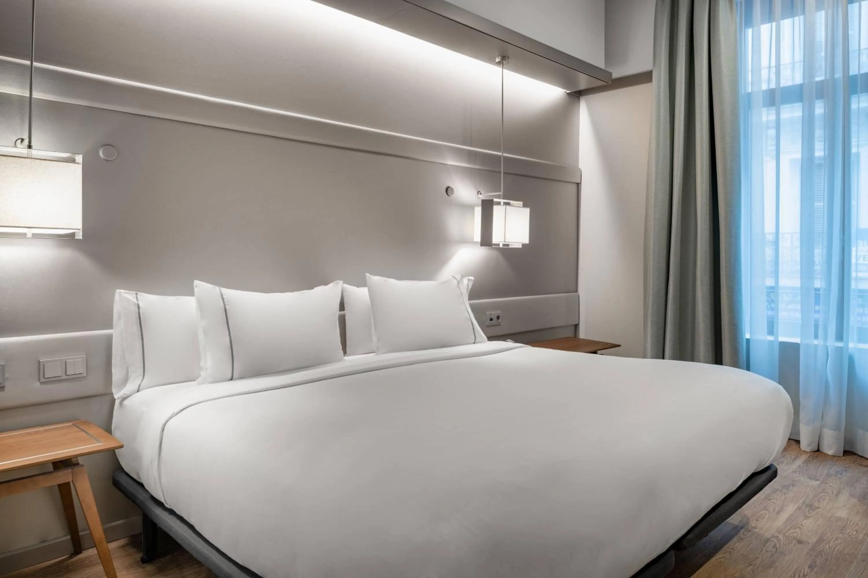 Photo of the whole room, Bed in AC Hotel Recoletos by Marriott