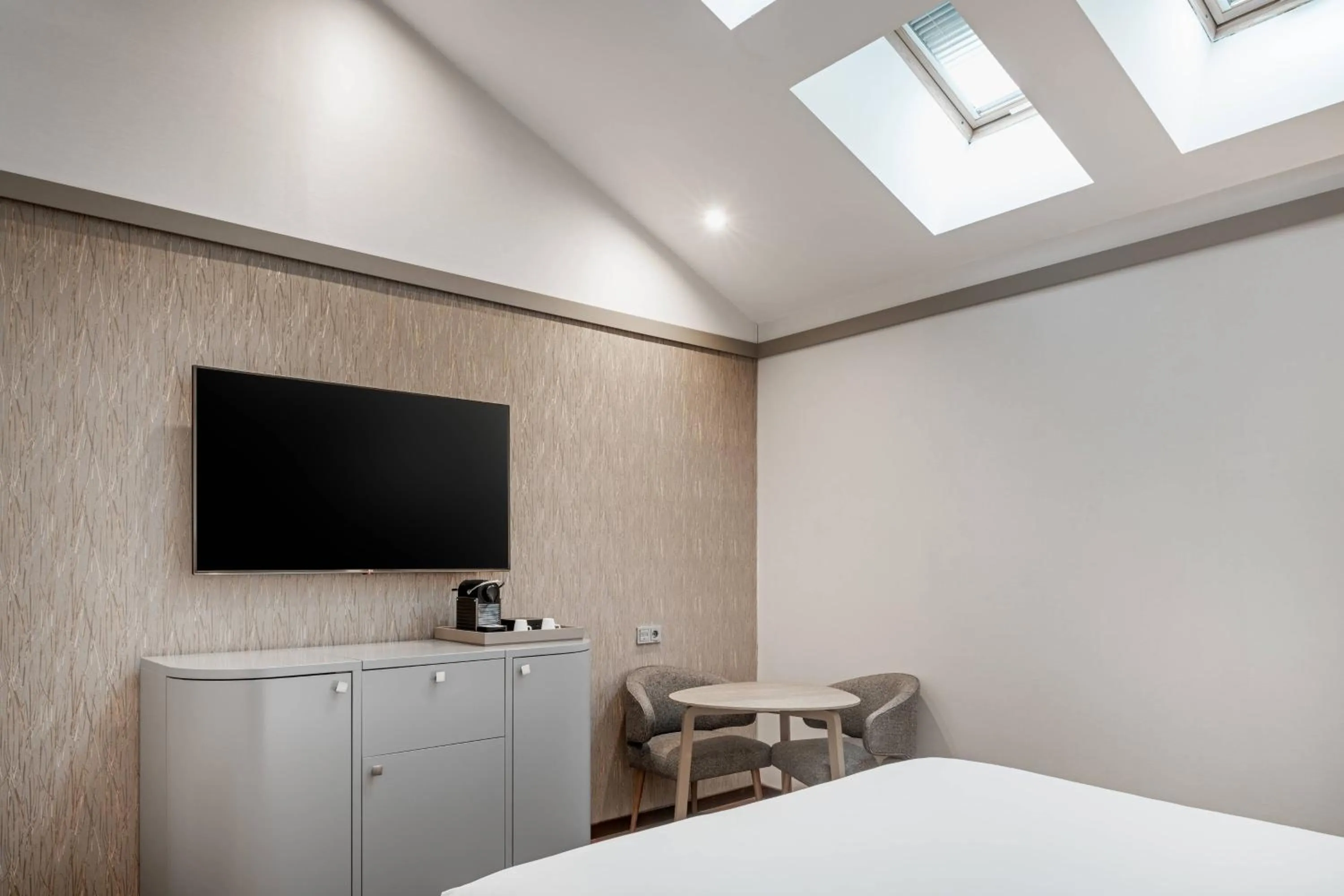 Photo of the whole room, Bed in AC Hotel Recoletos by Marriott