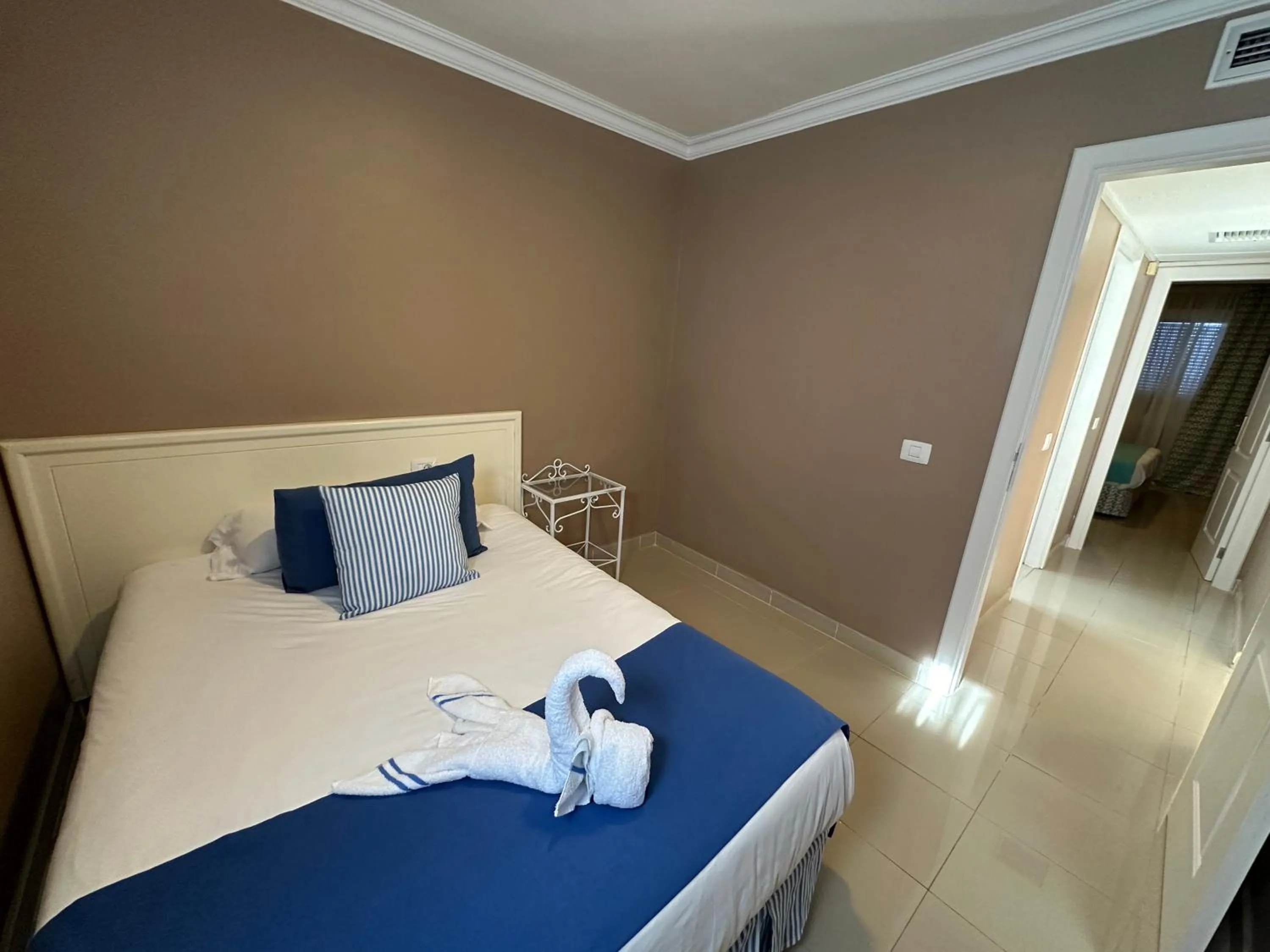 Bedroom, Bed in RF La Quinta Park Suites