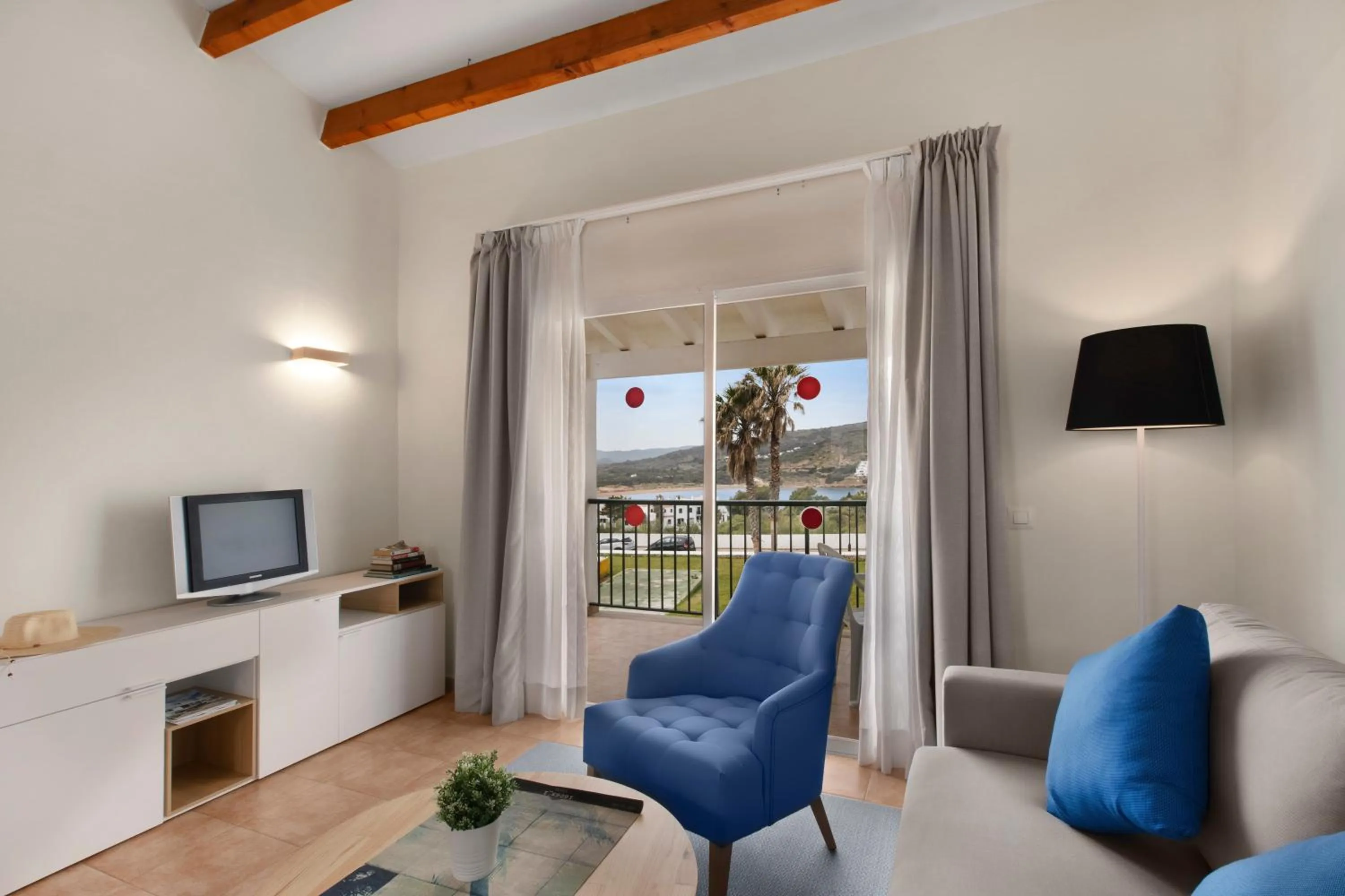 Communal lounge/ TV room in TRH Tirant Playa