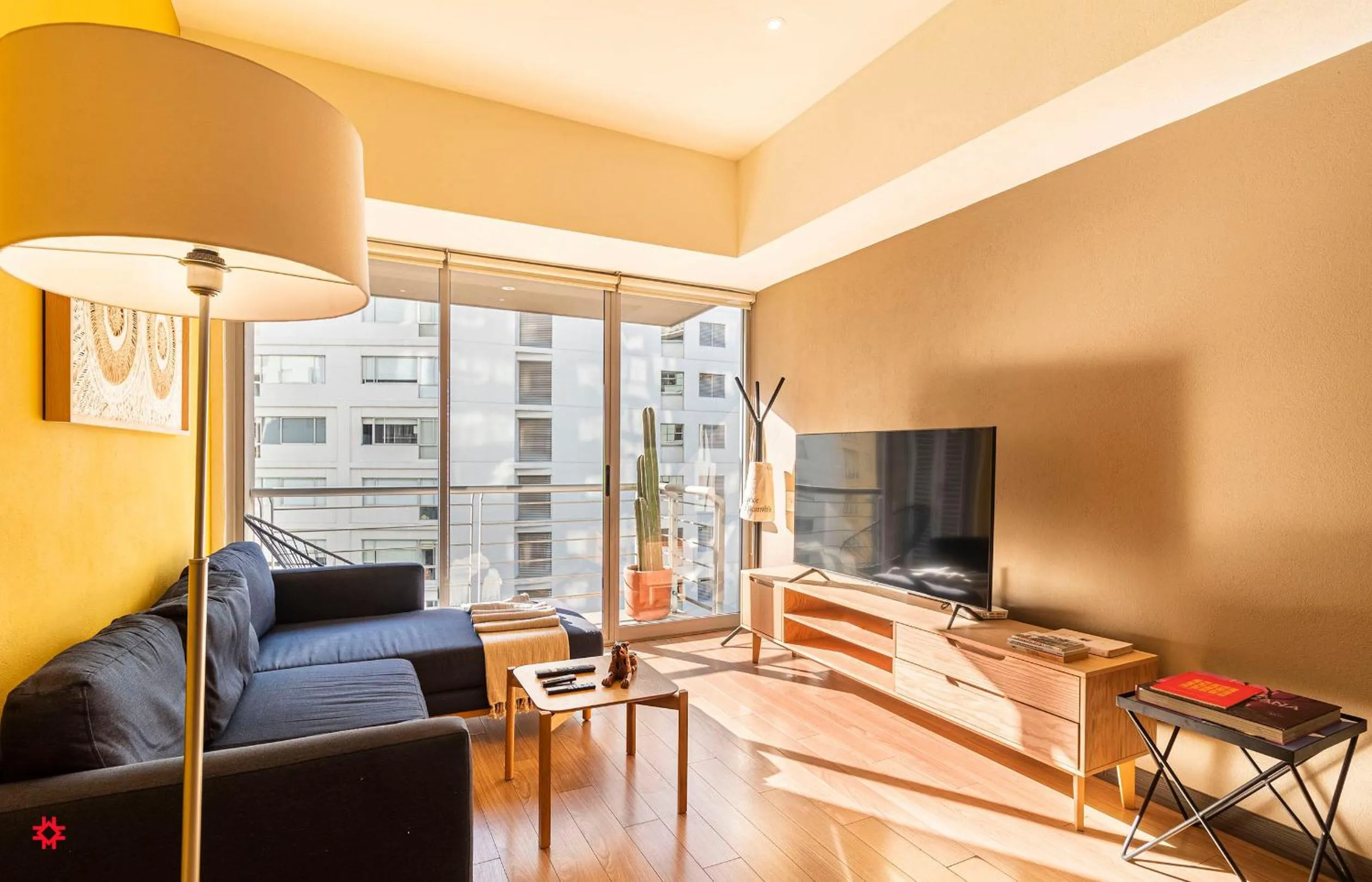 Communal lounge/ TV room in Casa Vive Grand by Kukun