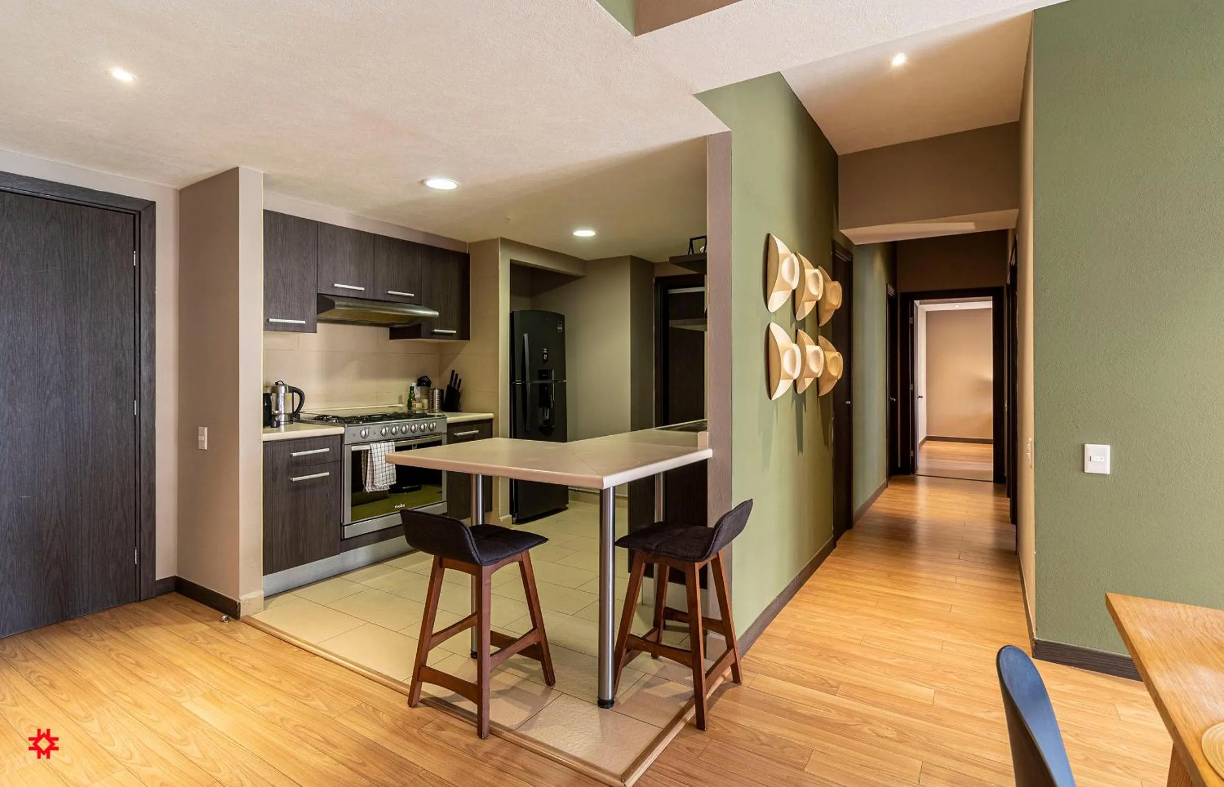 Kitchen or kitchenette in Casa Vive Grand by Kukun