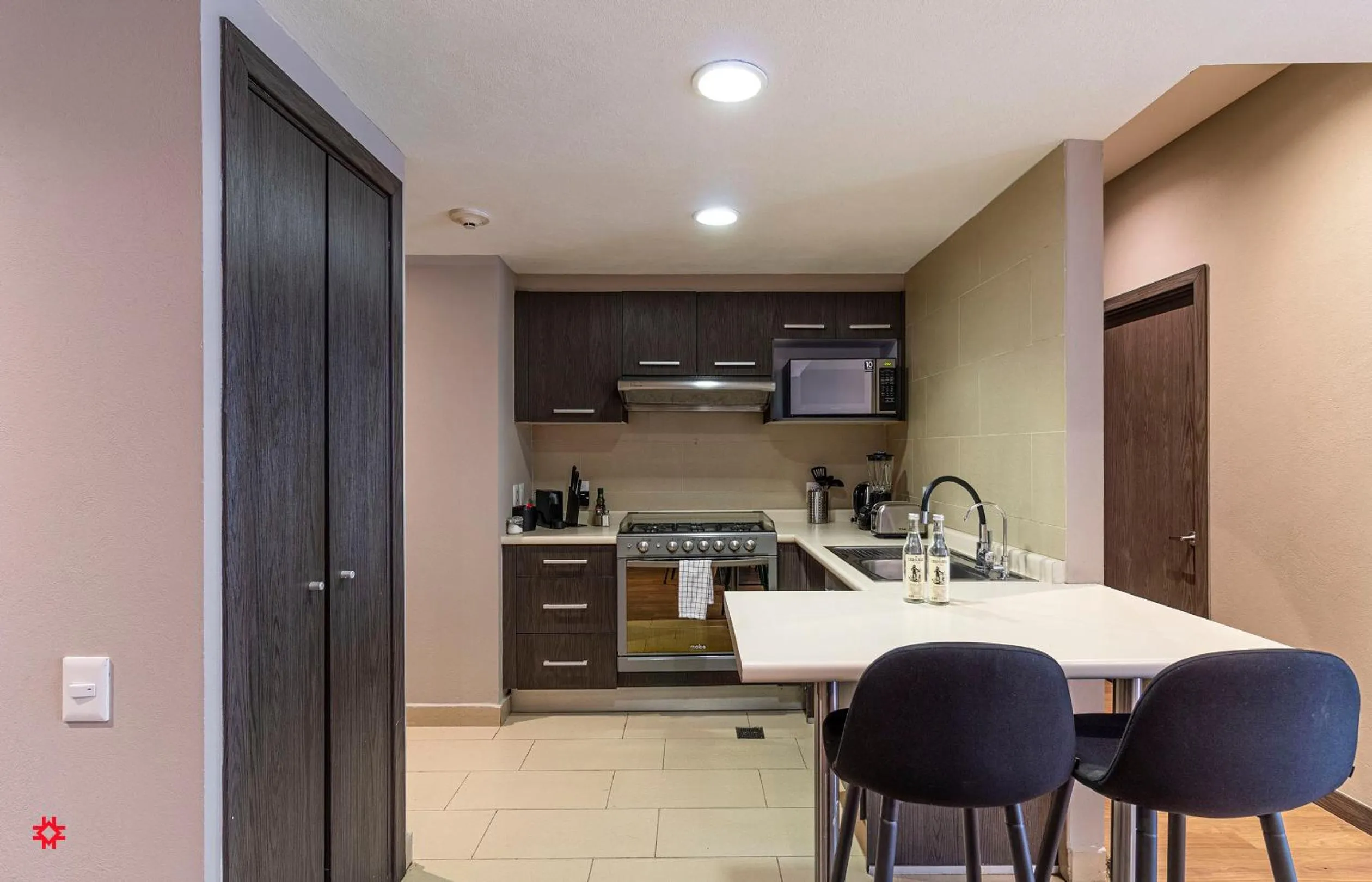 Kitchen or kitchenette in Casa Vive Grand by Kukun