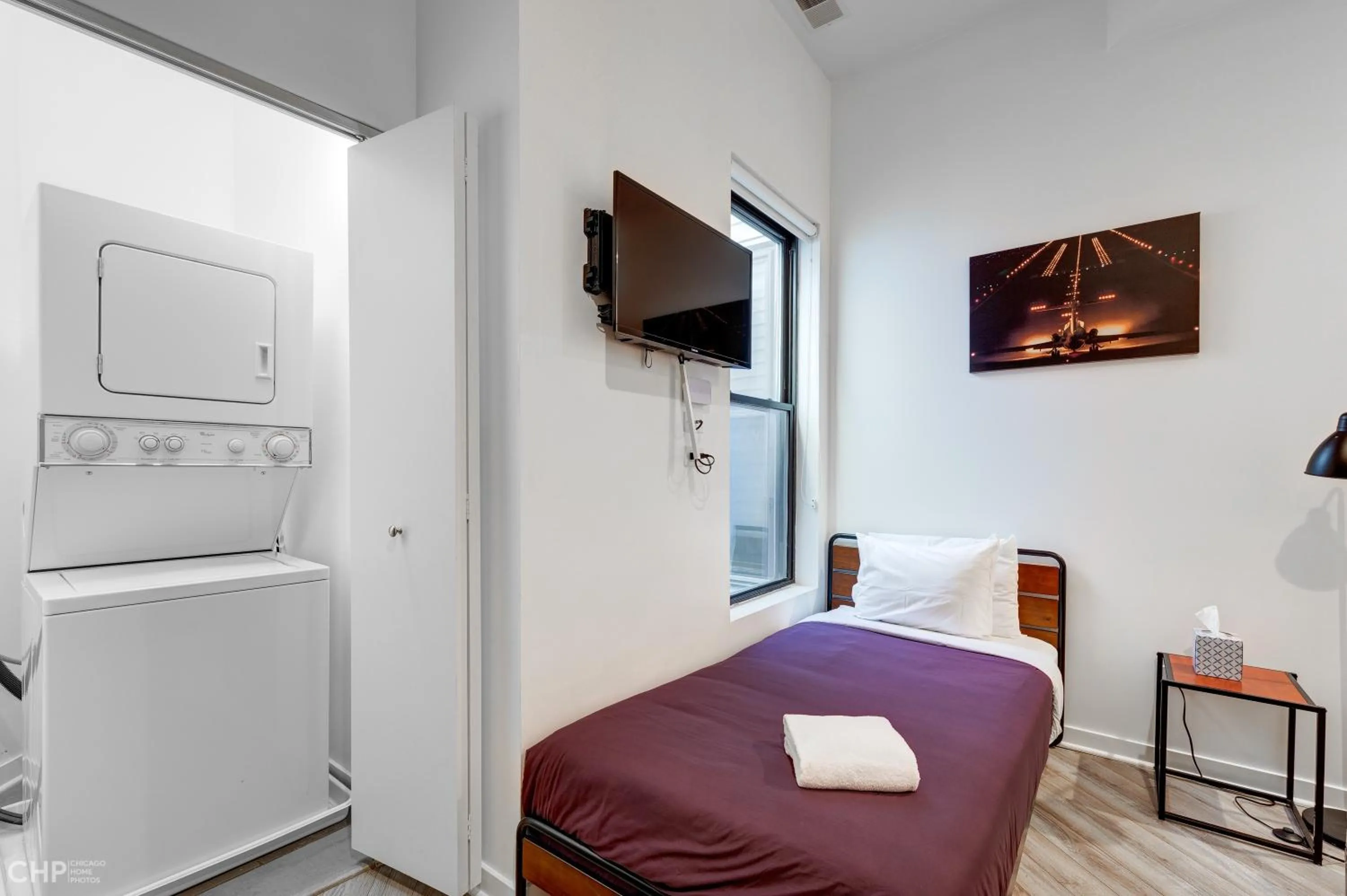 Bed in Chicago Second Floor Studio by 747 Lofts