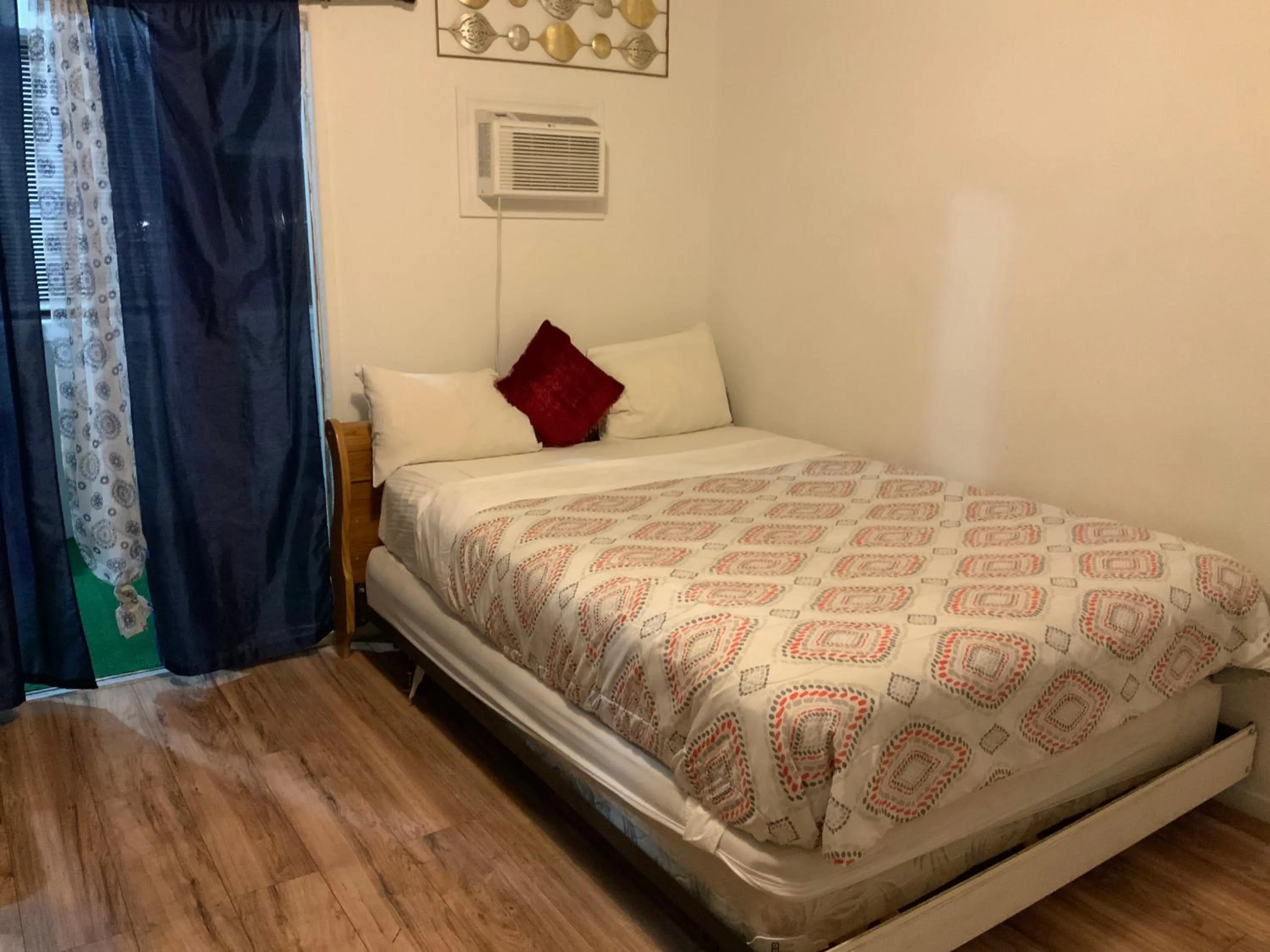 Bed in The Yellow Penthouse LLC