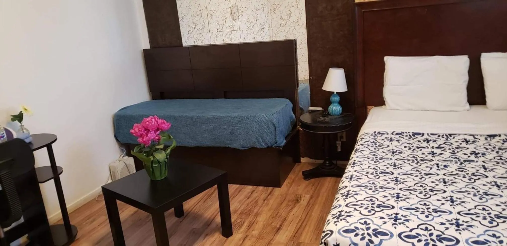 Bed in The Yellow Penthouse LLC