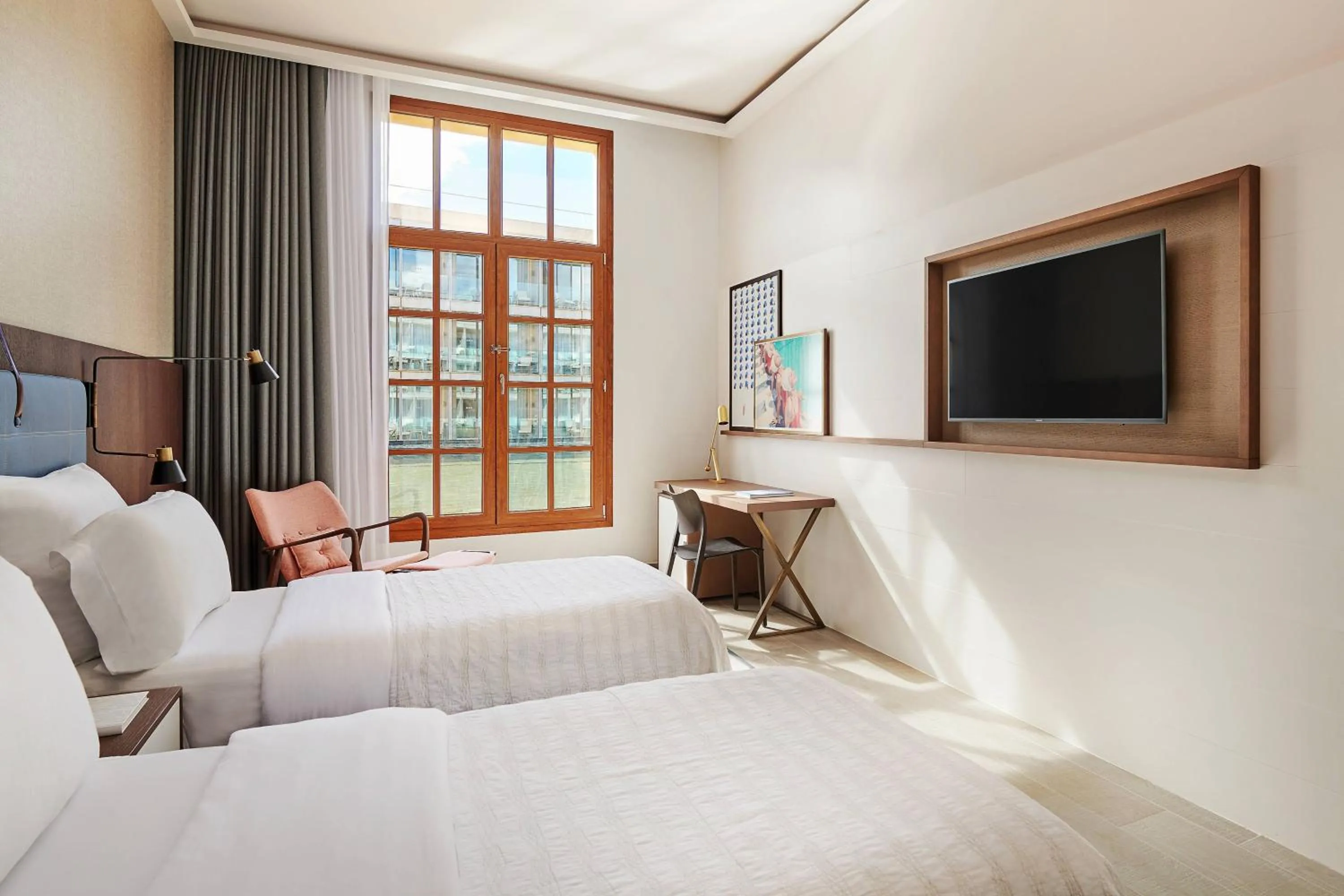 Photo of the whole room, Bed in Le Meridien Ra Beach Hotel and Spa