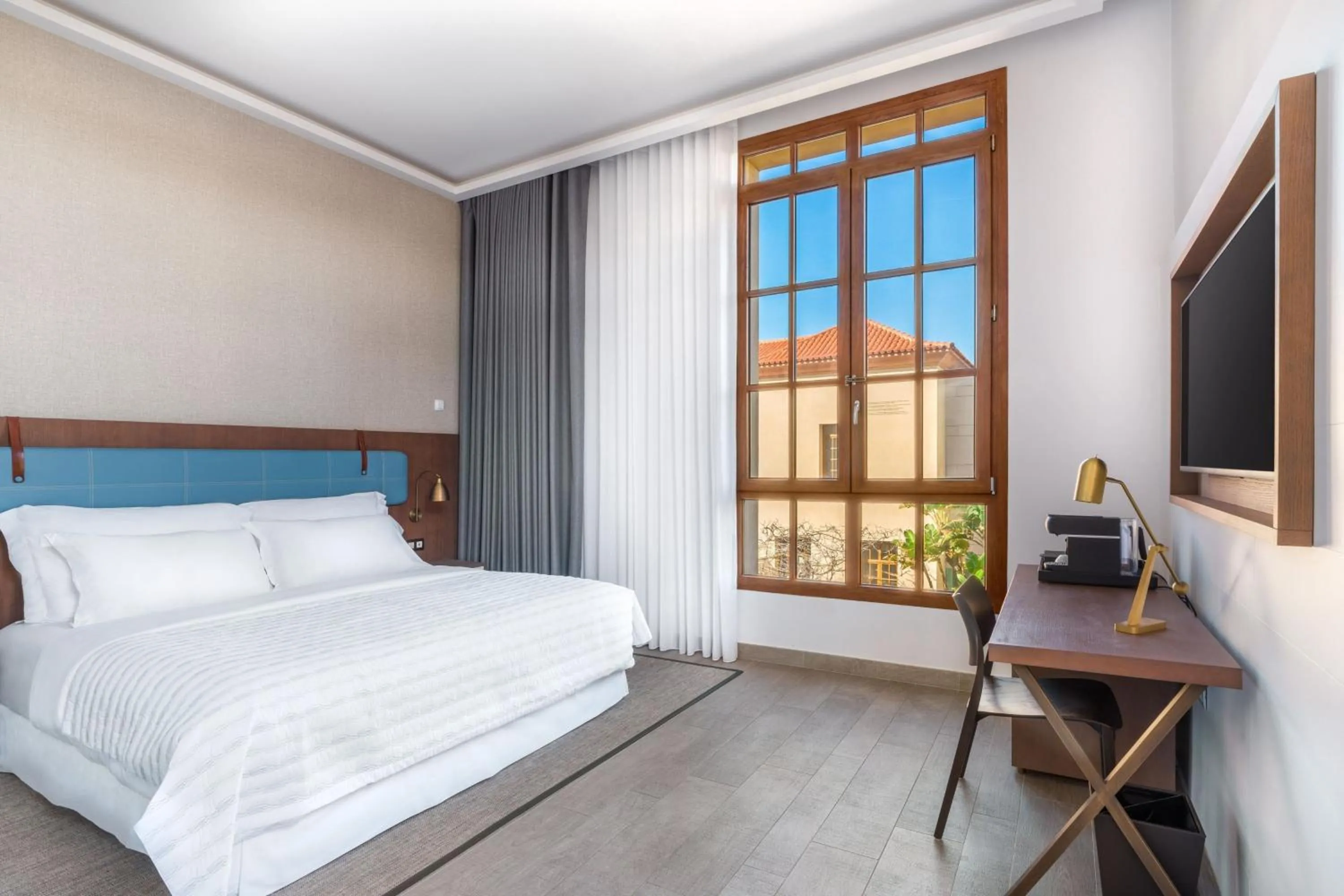 Photo of the whole room, Bed in Le Meridien Ra Beach Hotel and Spa