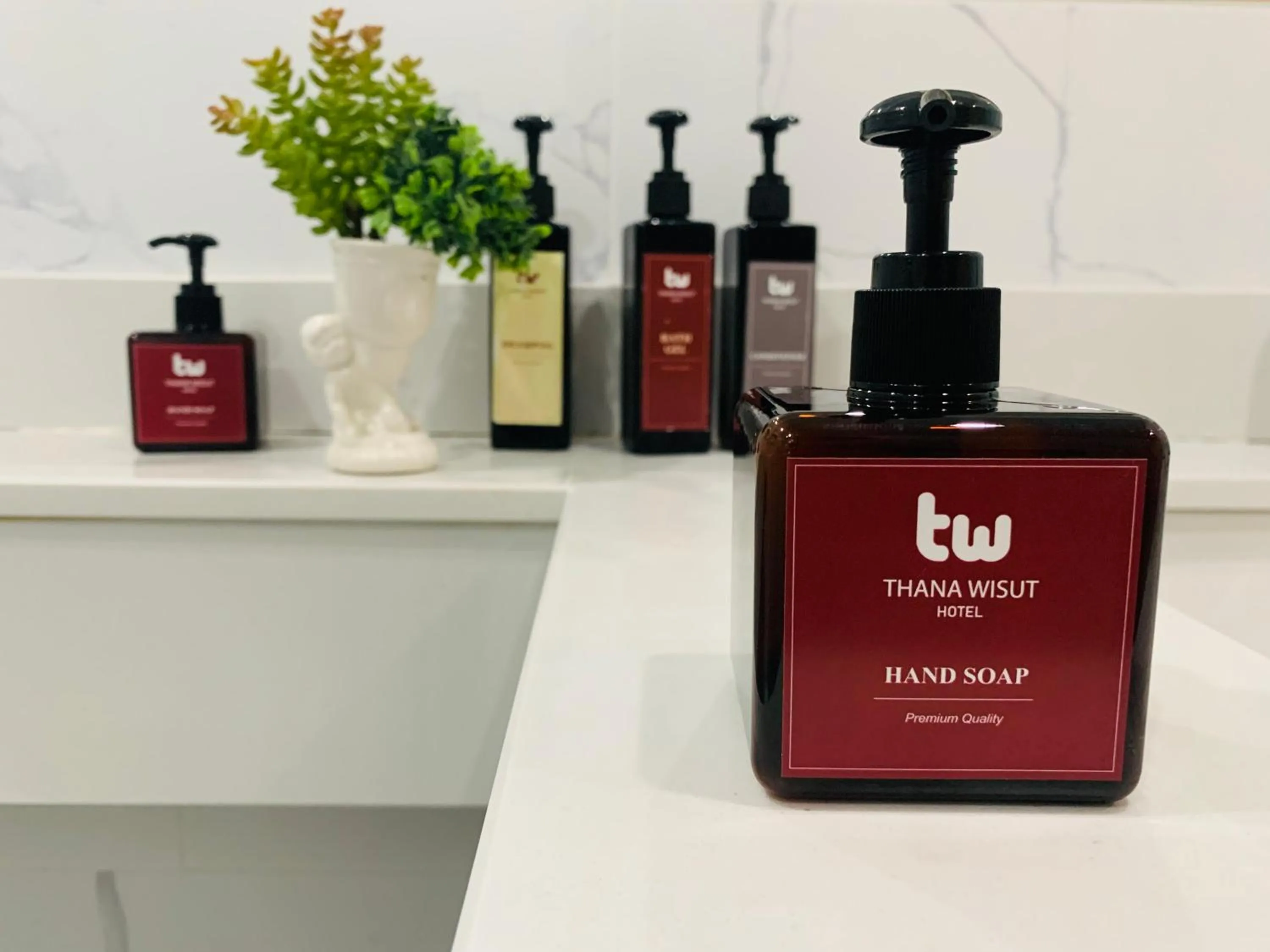 Bathroom in Thana Wisut Hotel