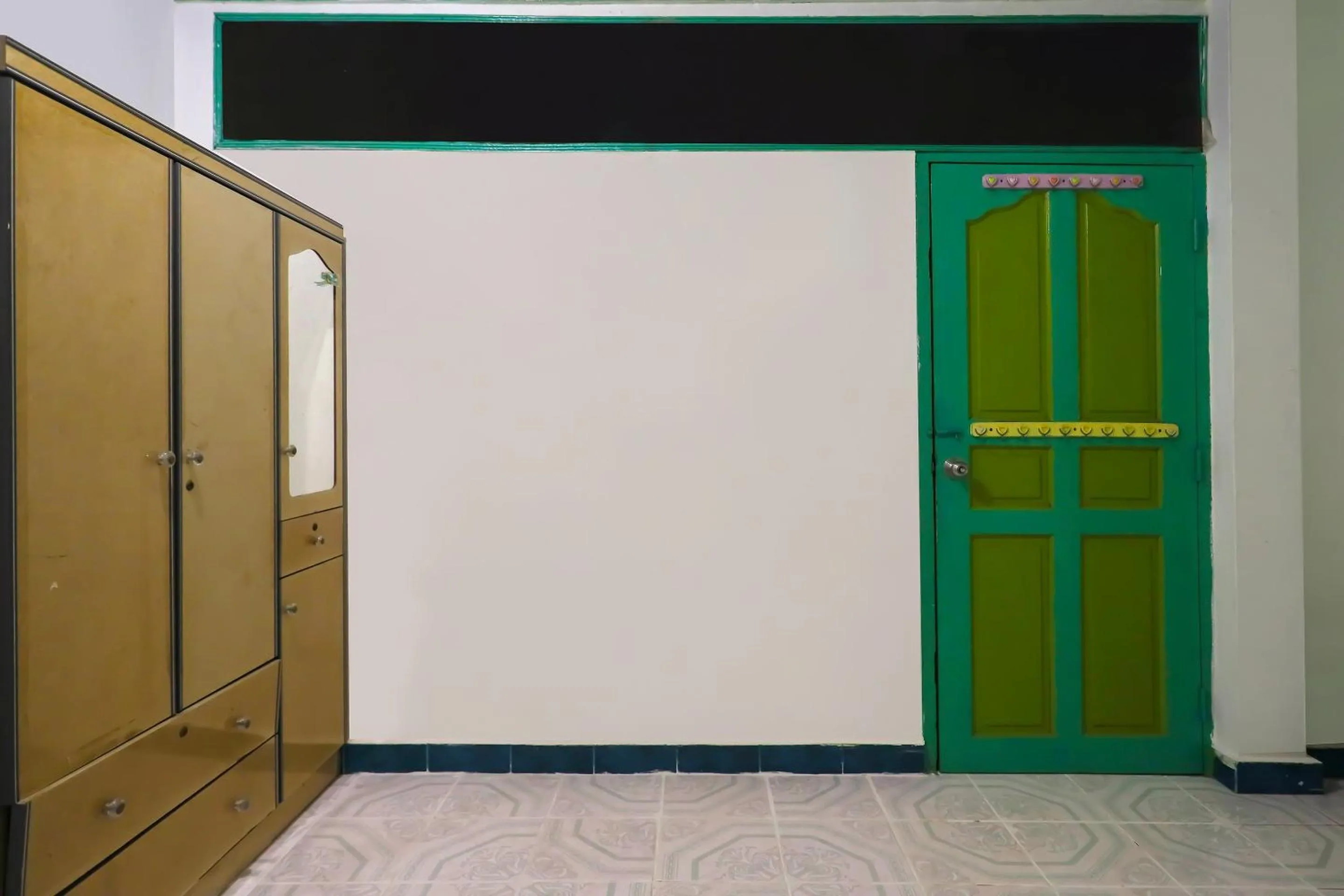 Bedroom in Hotel O Homestay Bude Sri