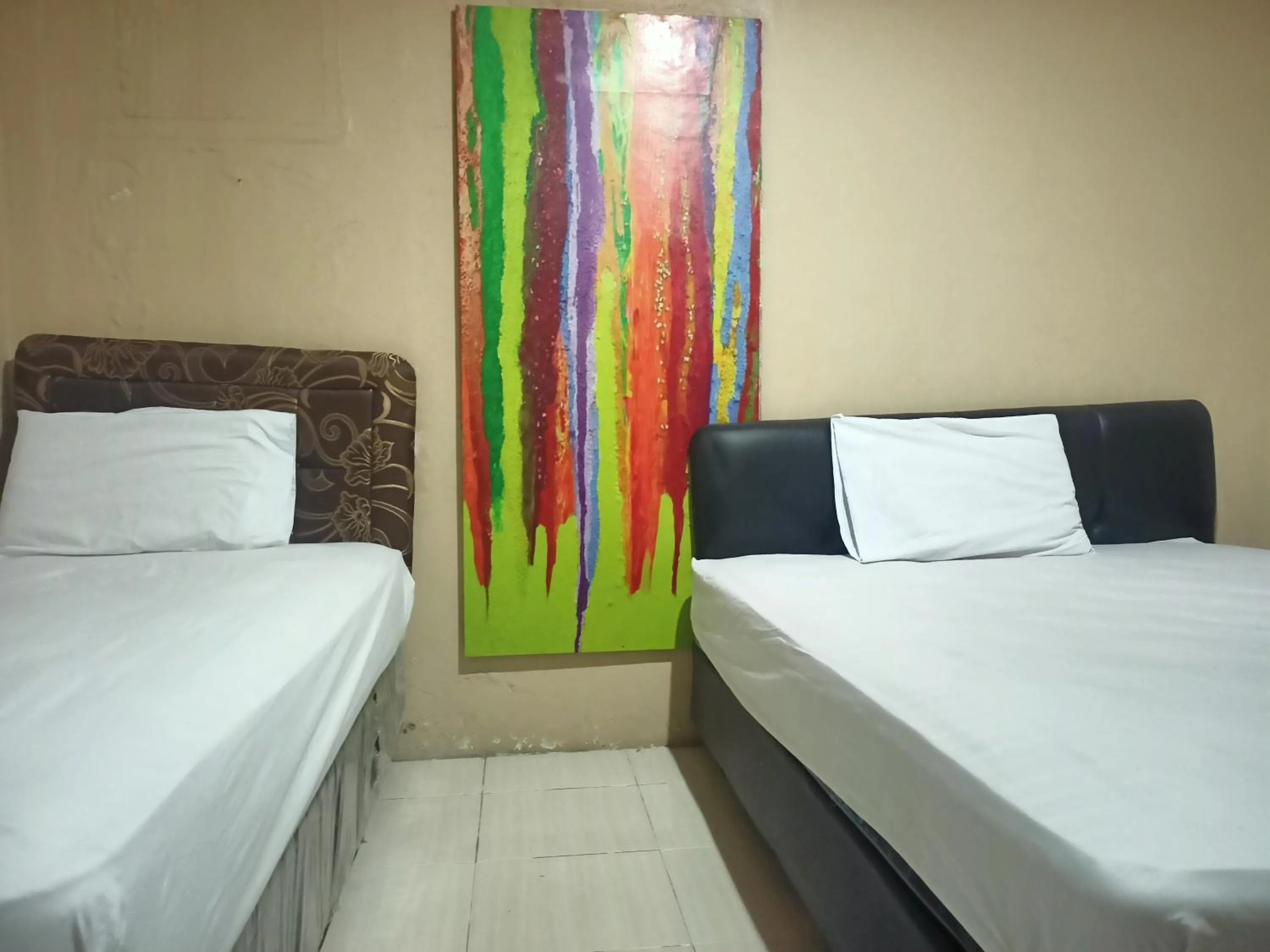 Bedroom in Hotel O Syariah Sumber Mulya NunukanNearAlun - Alun Kota Nunukan