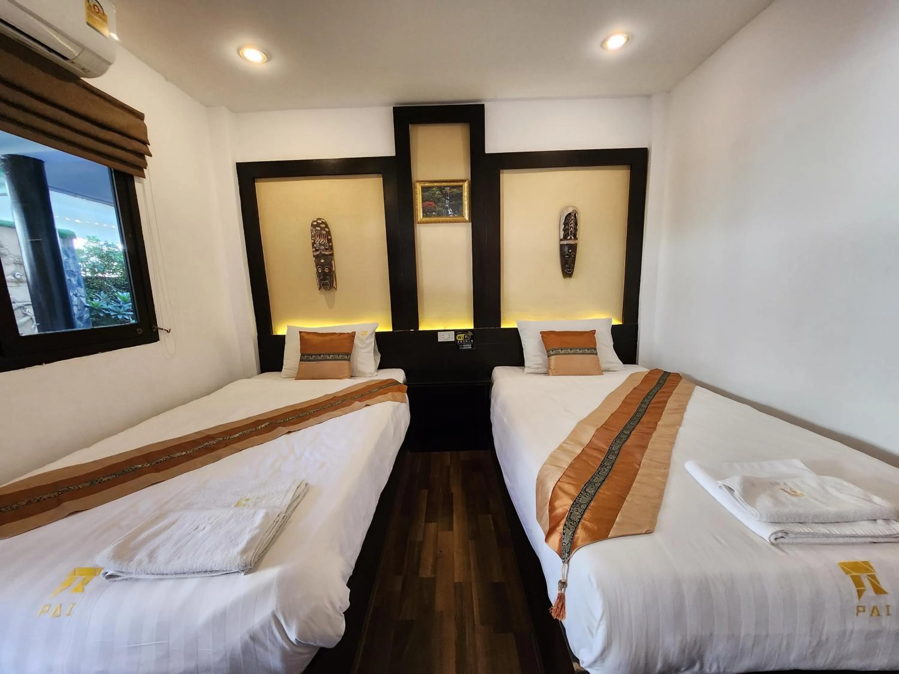 Bed in Pai Residence Hotel