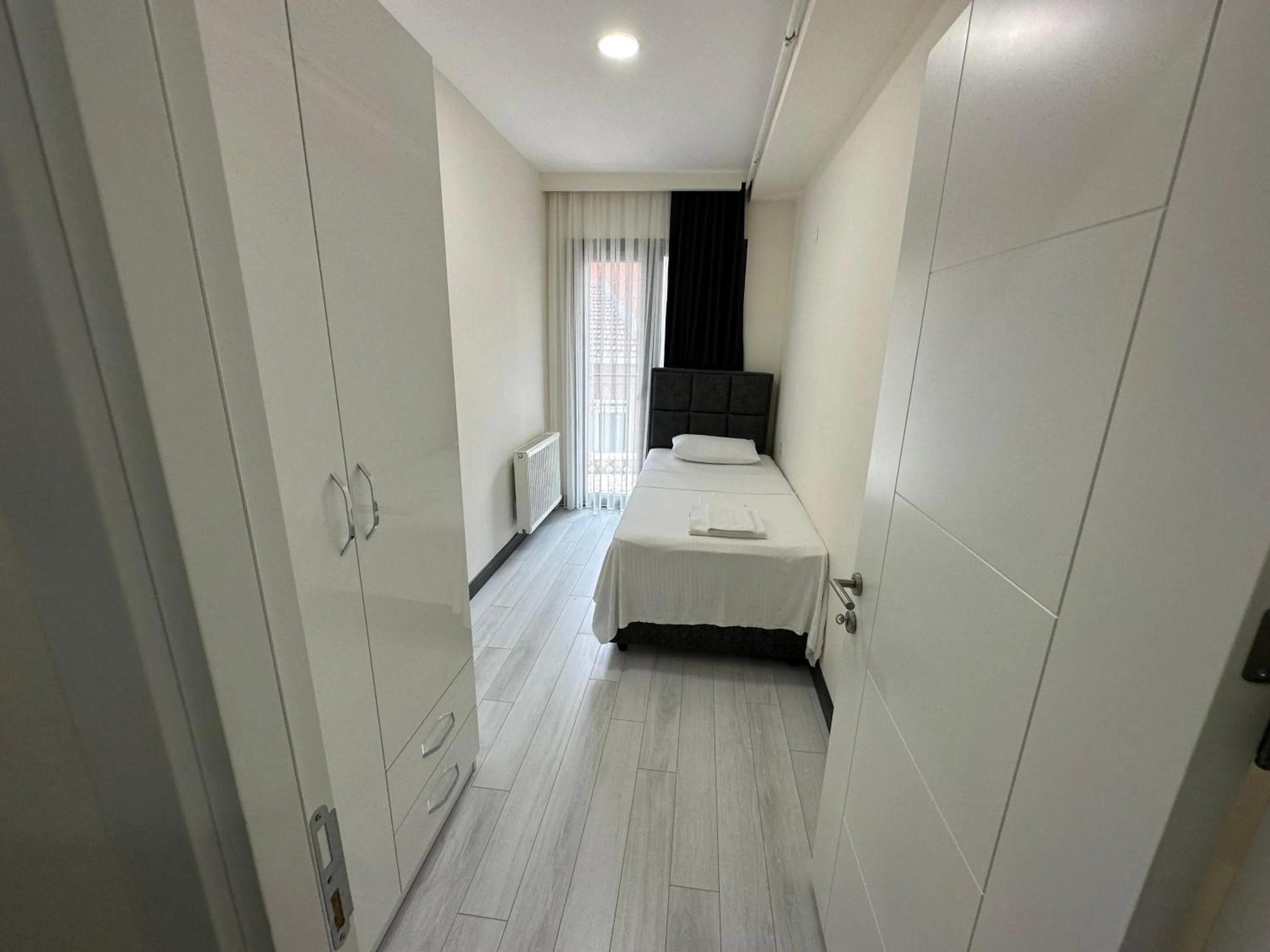 Bed in Rose Plus Residence