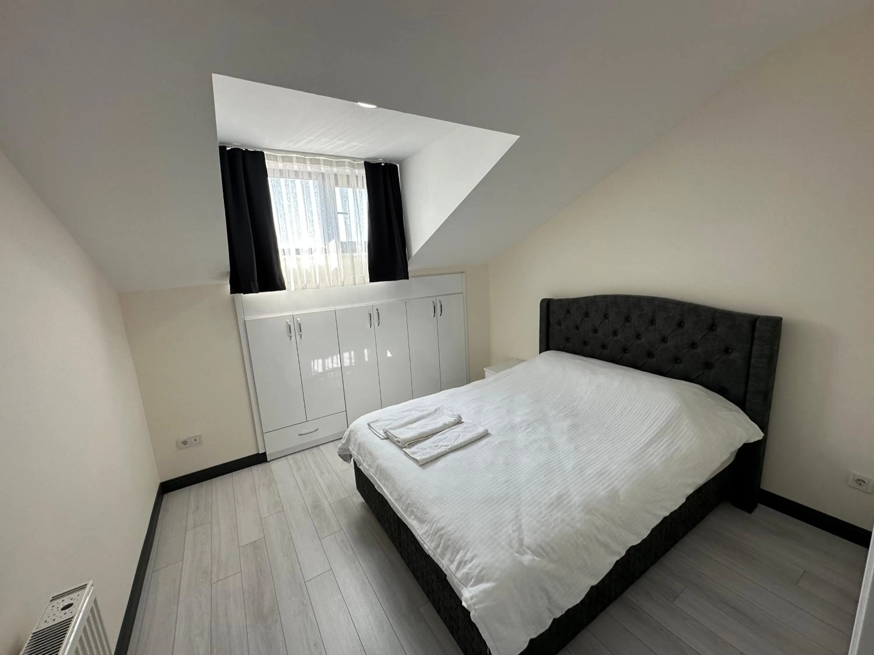 Bed in Rose Plus Residence