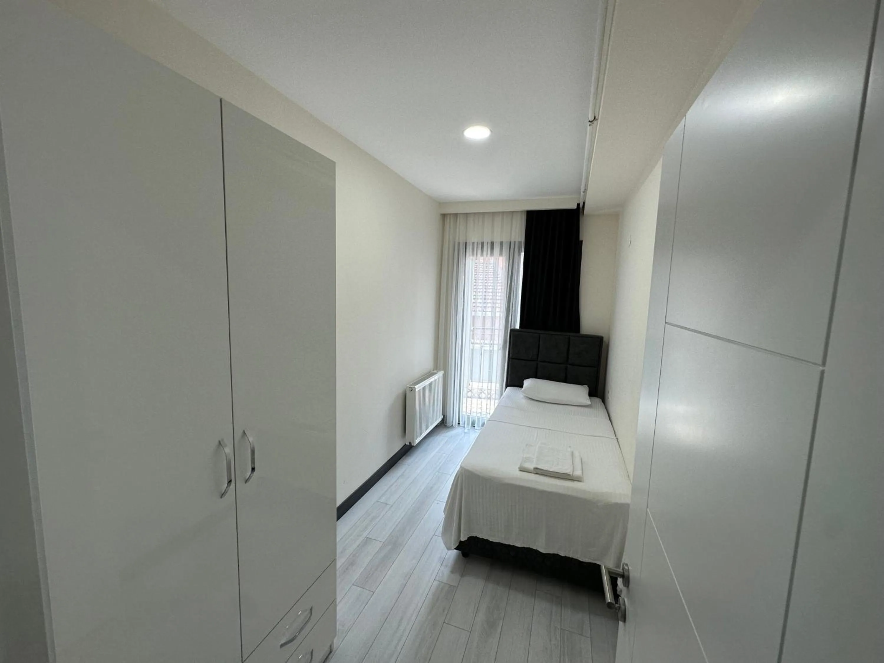 Bed in Rose Plus Residence