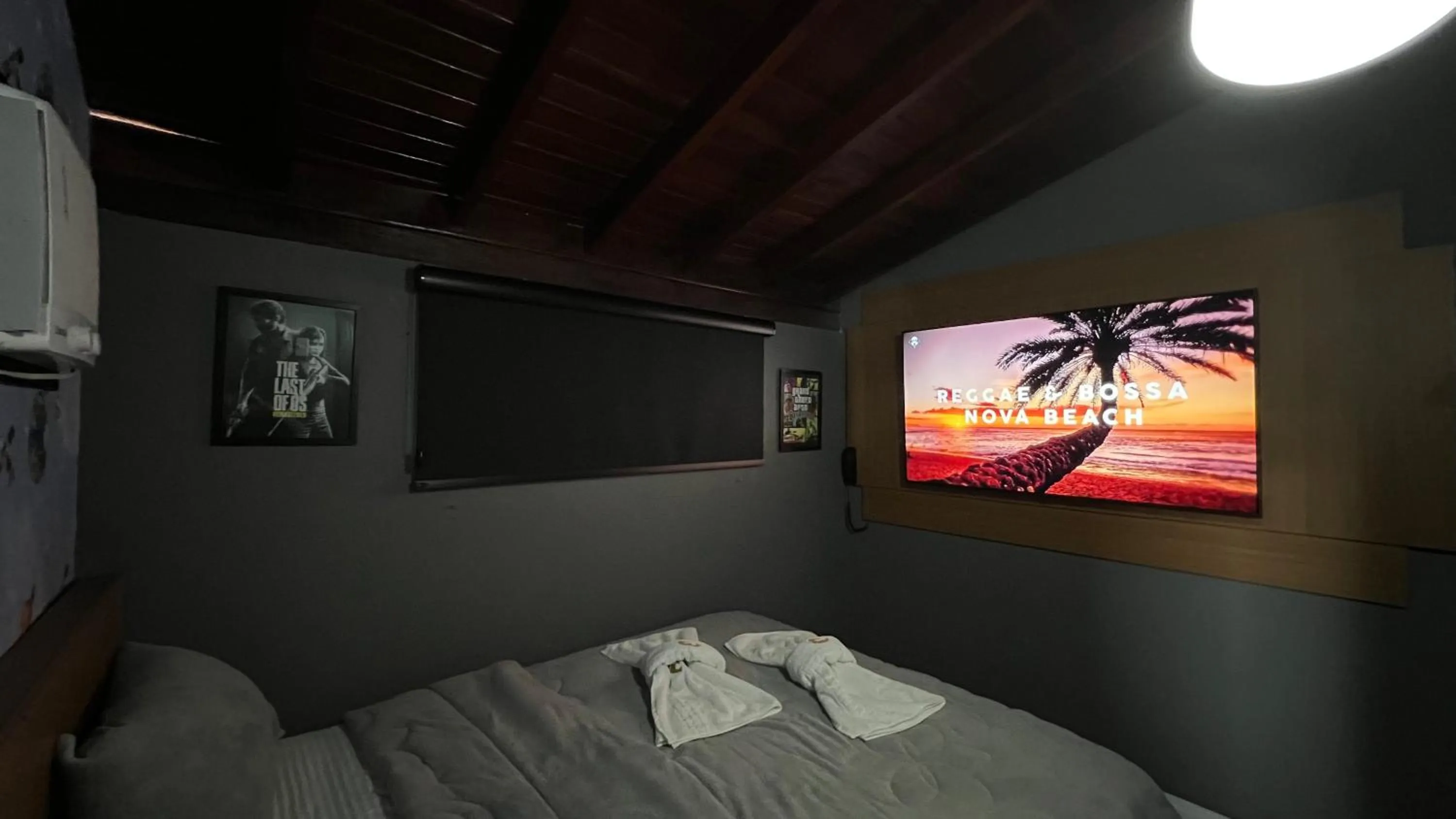 Communal lounge/ TV room, Bed in Hotel La Serena