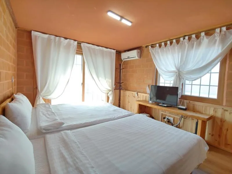 Bed in Jeju Hanibaram Pension