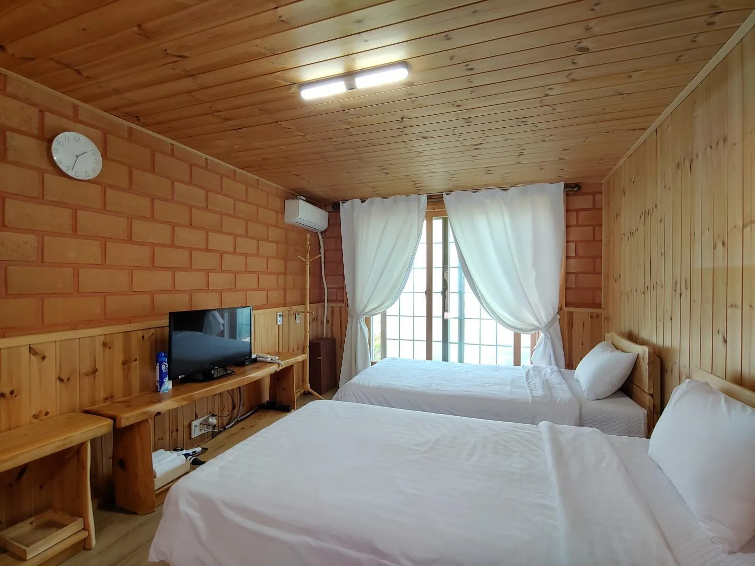 Bed in Jeju Hanibaram Pension