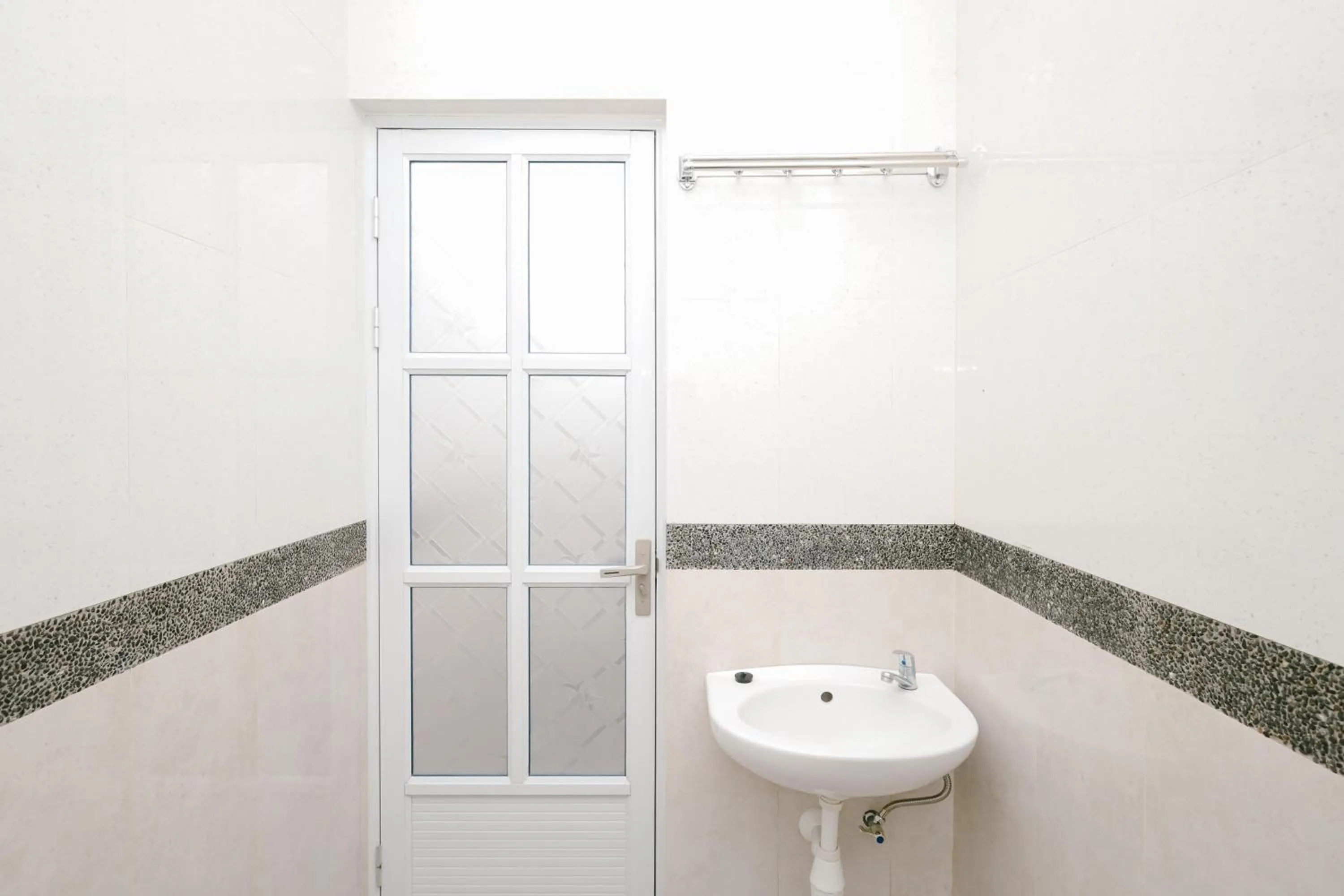 Bathroom in Urbanview B Syariah Lumajang by RedDoorz