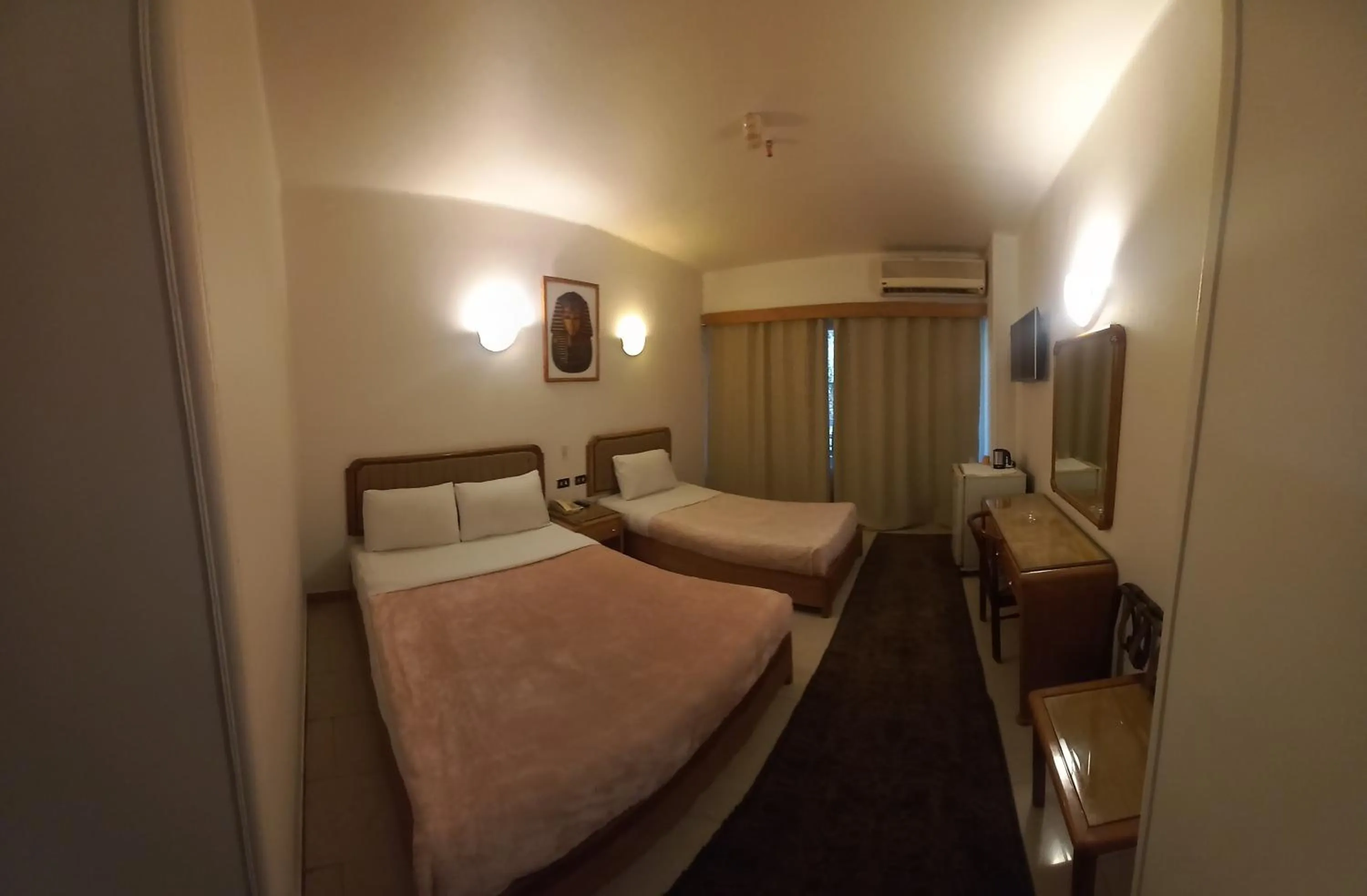 Photo of the whole room, Bed in New Pola Hotel