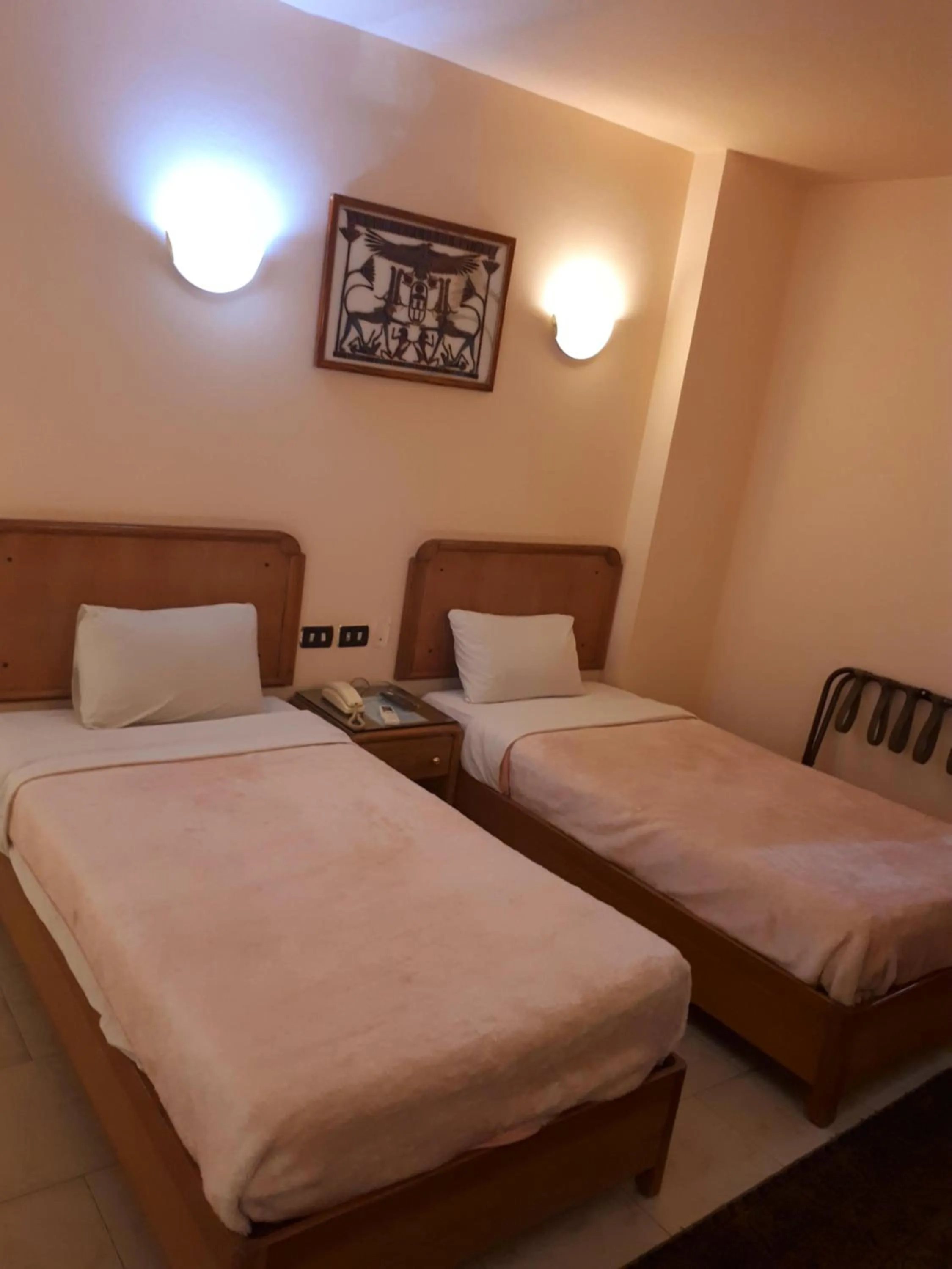 Bed in New Pola Hotel