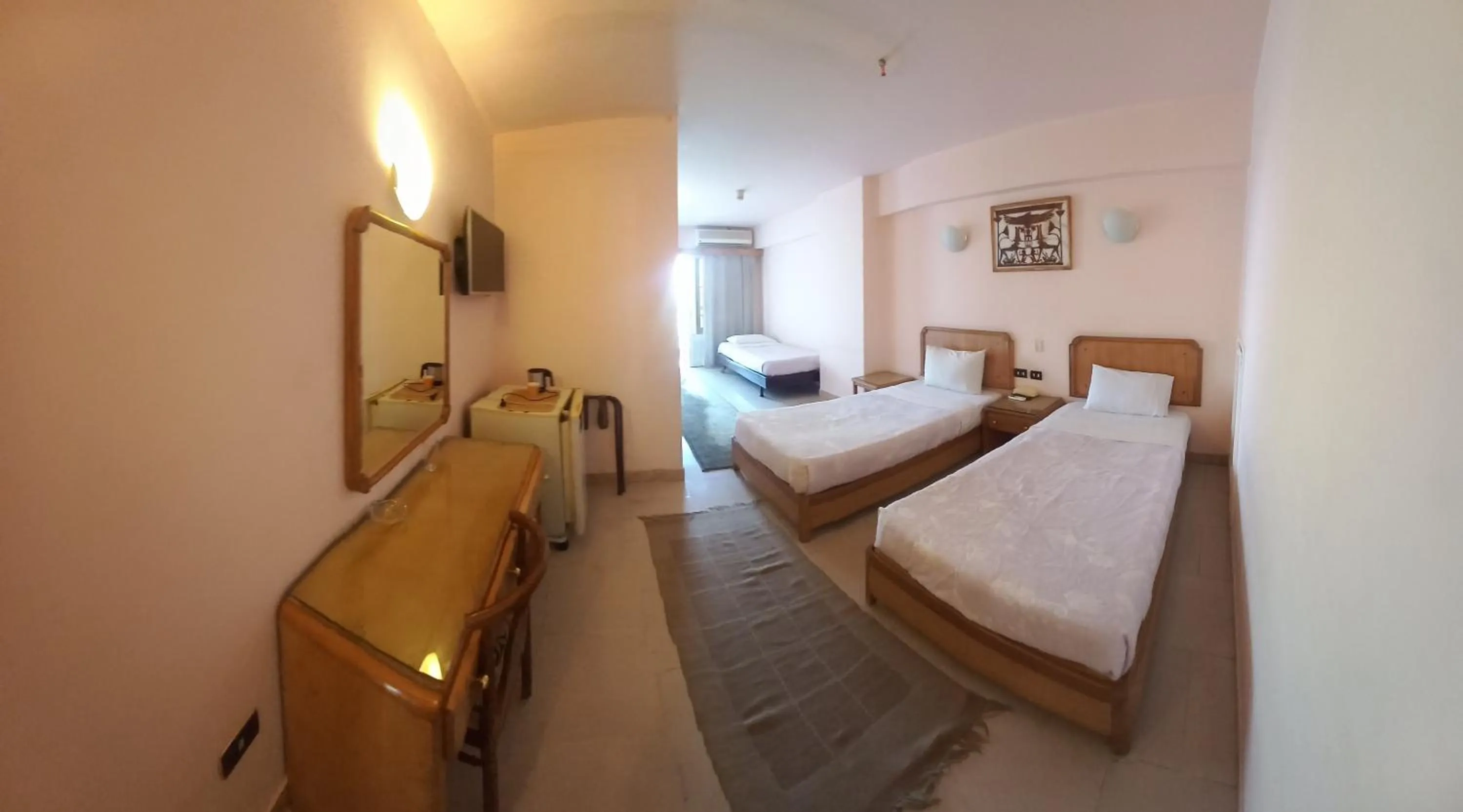 Photo of the whole room, Bed in New Pola Hotel