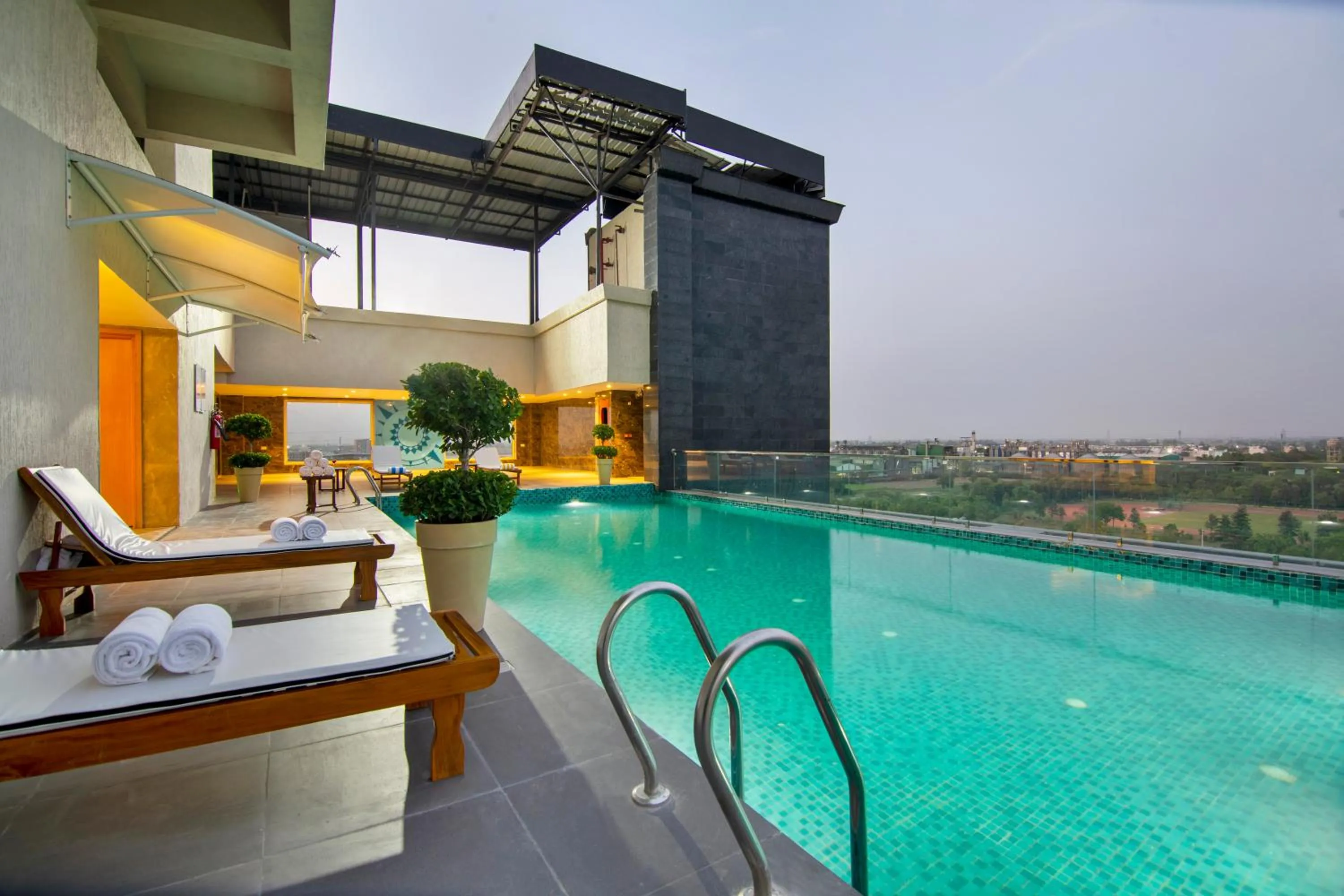 Swimming pool in Sarovar Portico Sonipat