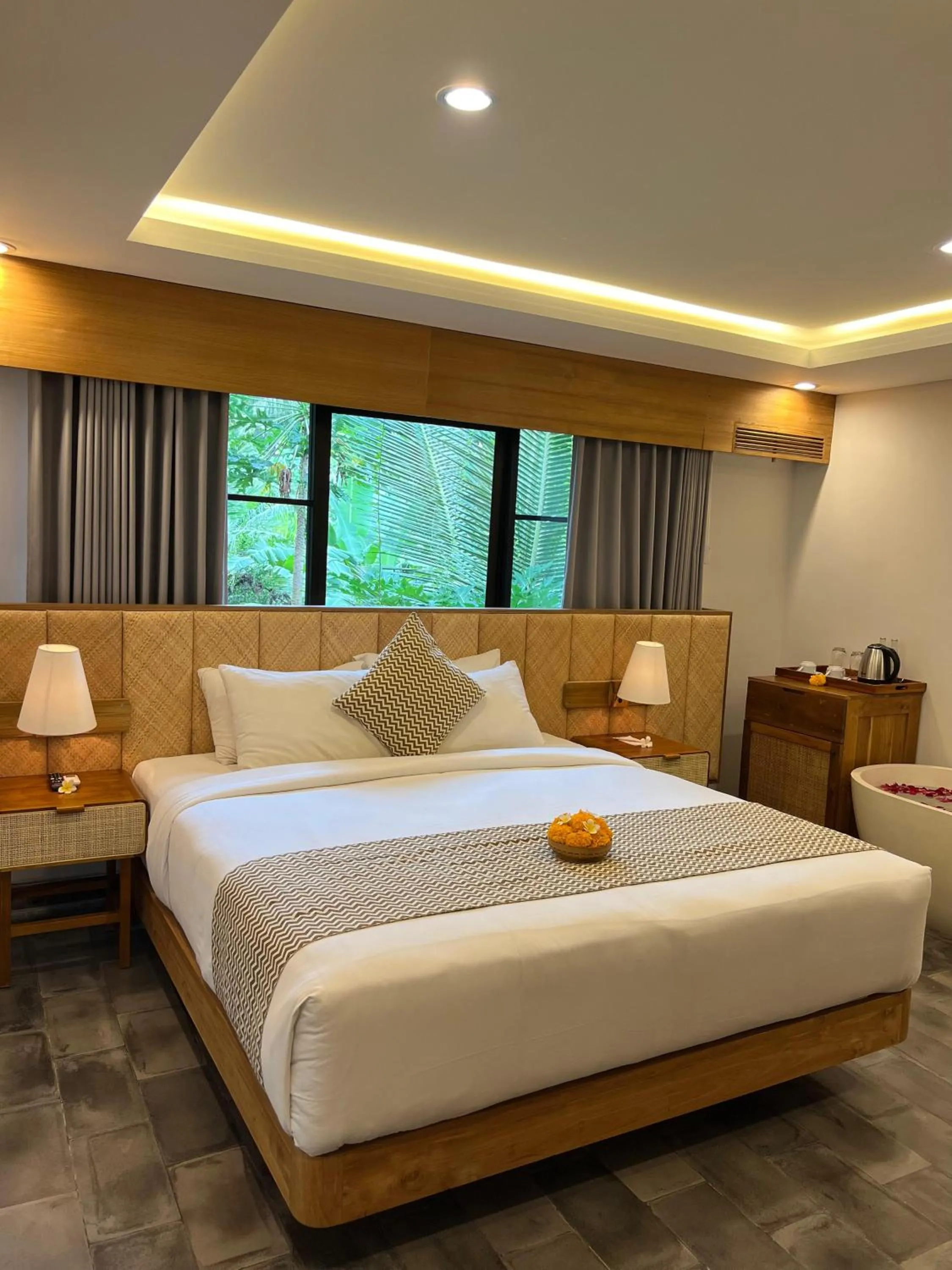 Bed in RUMAH KAYU RESORT