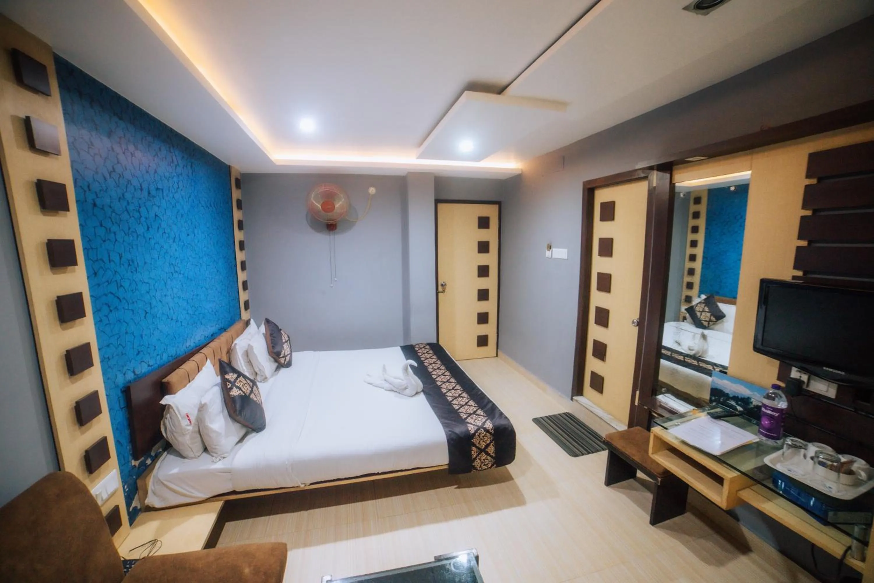 Bed in Amarjeet Hotel