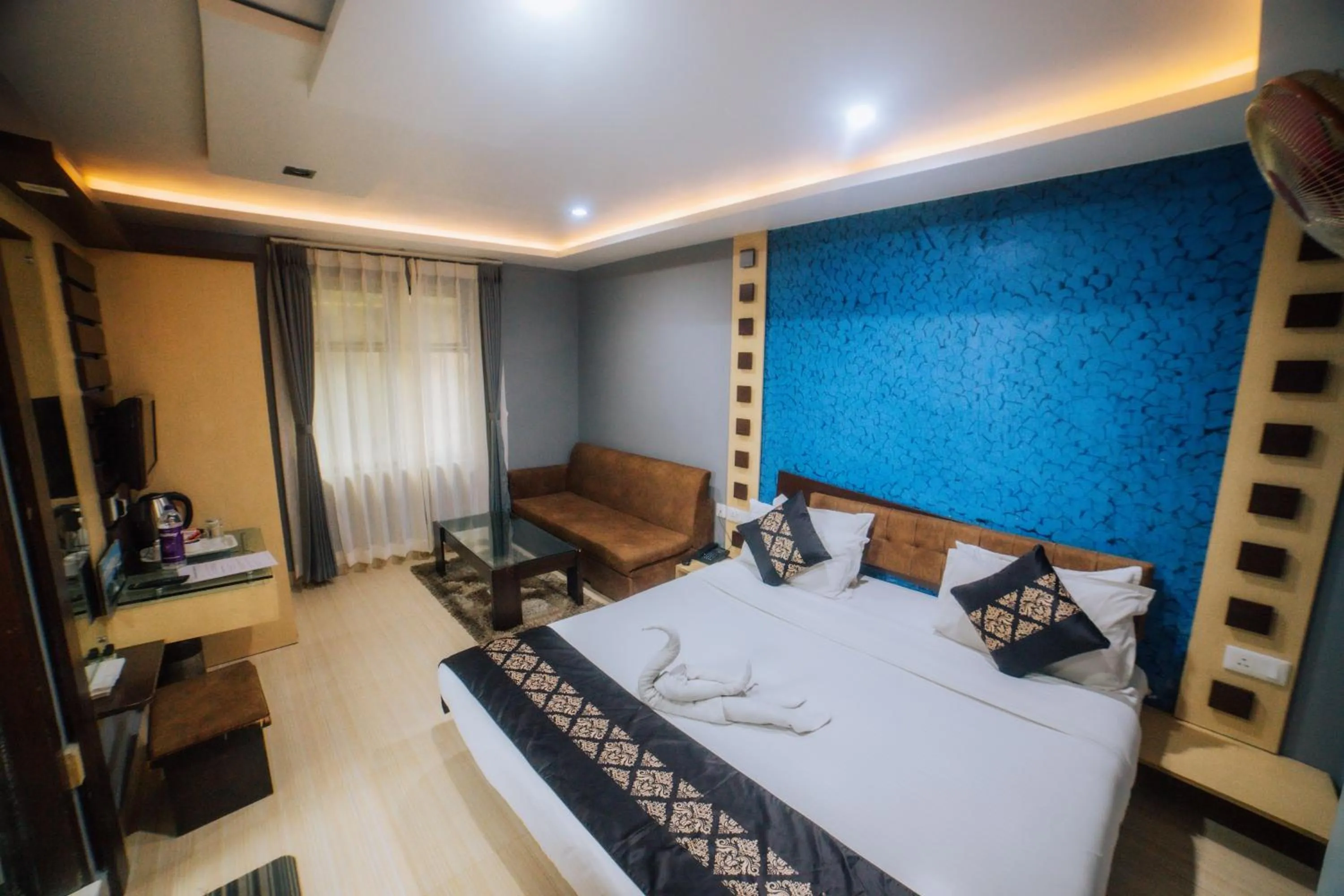 Bed in Amarjeet Hotel