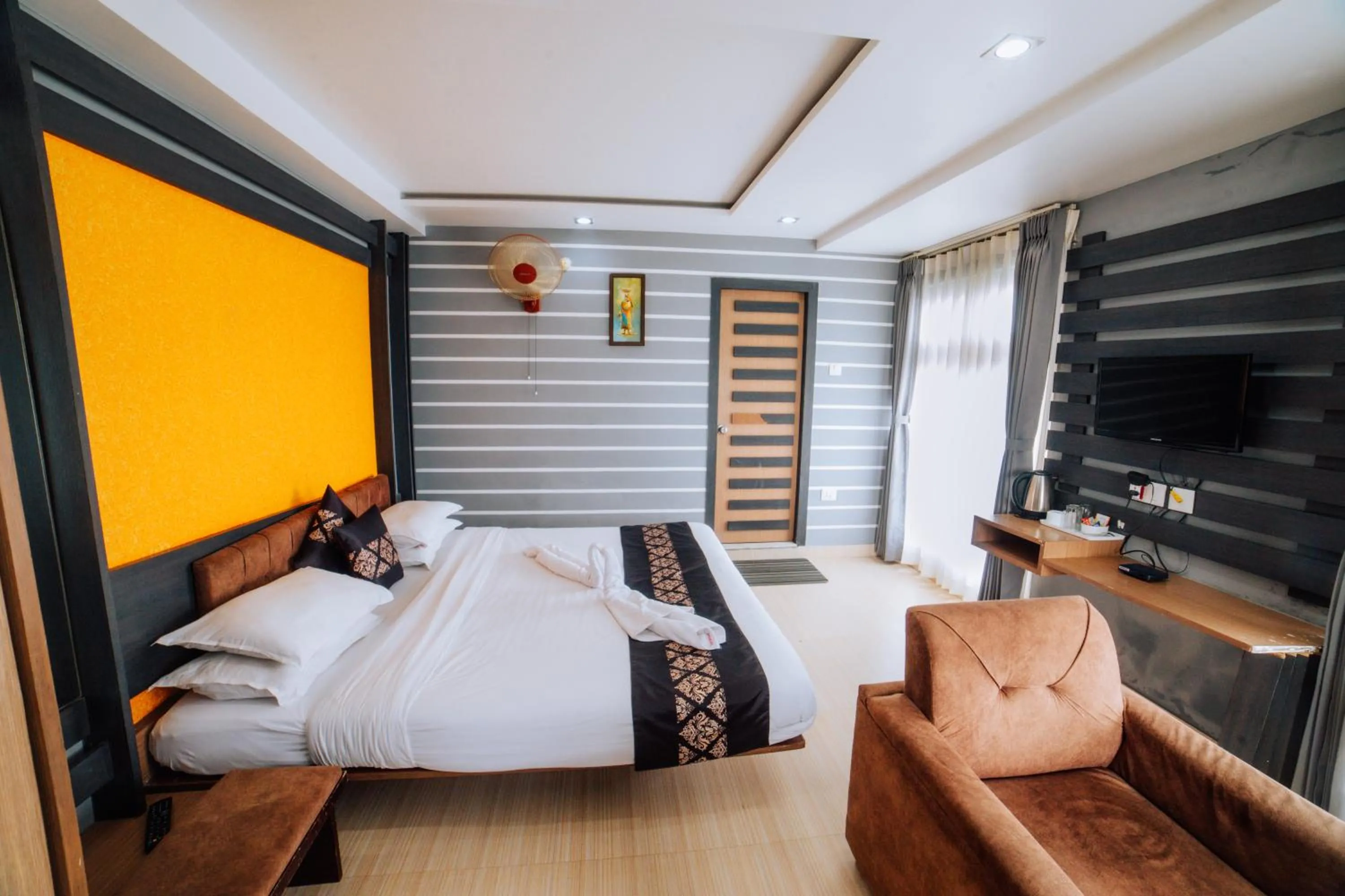 Bed in Amarjeet Hotel