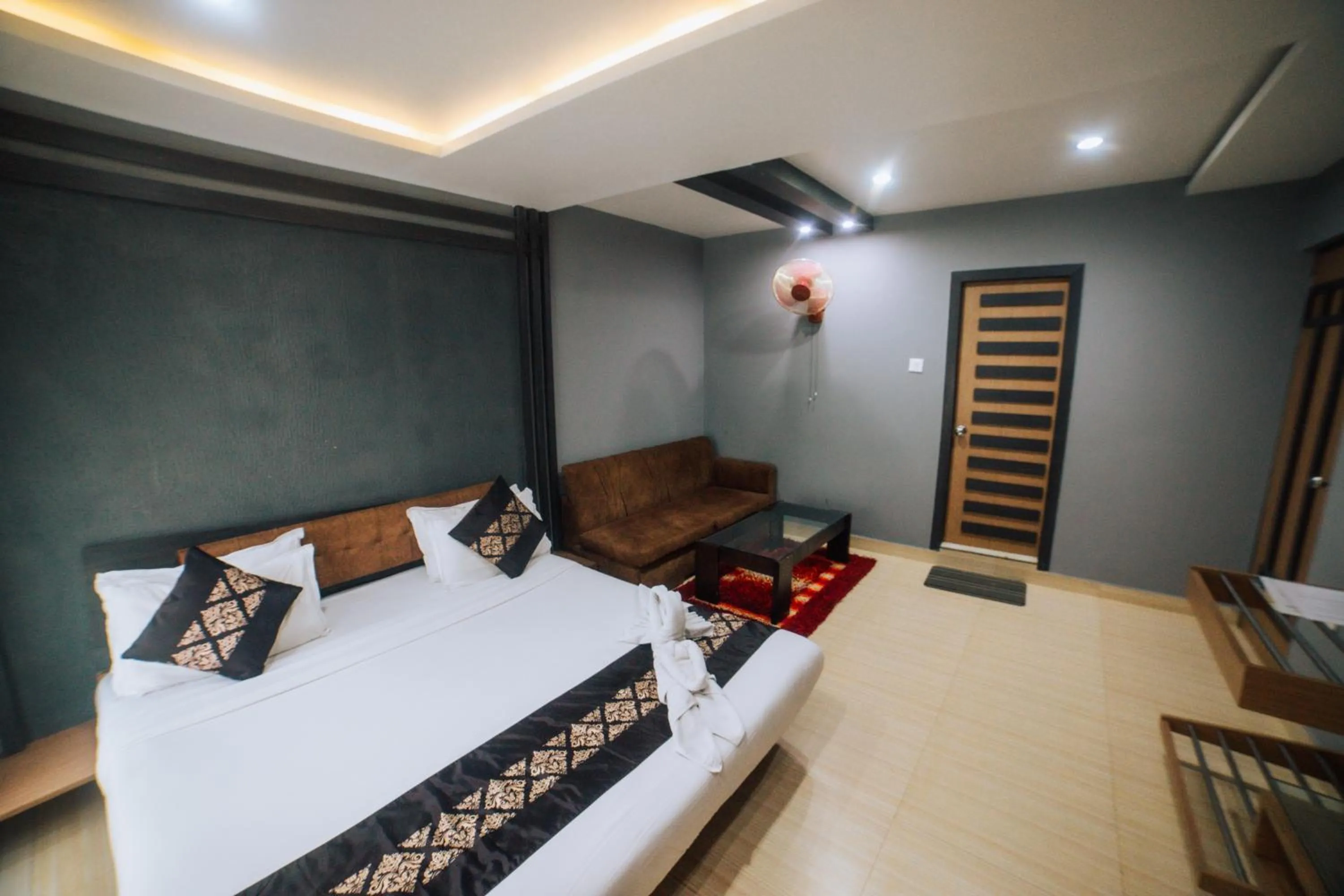 Bed in Amarjeet Hotel