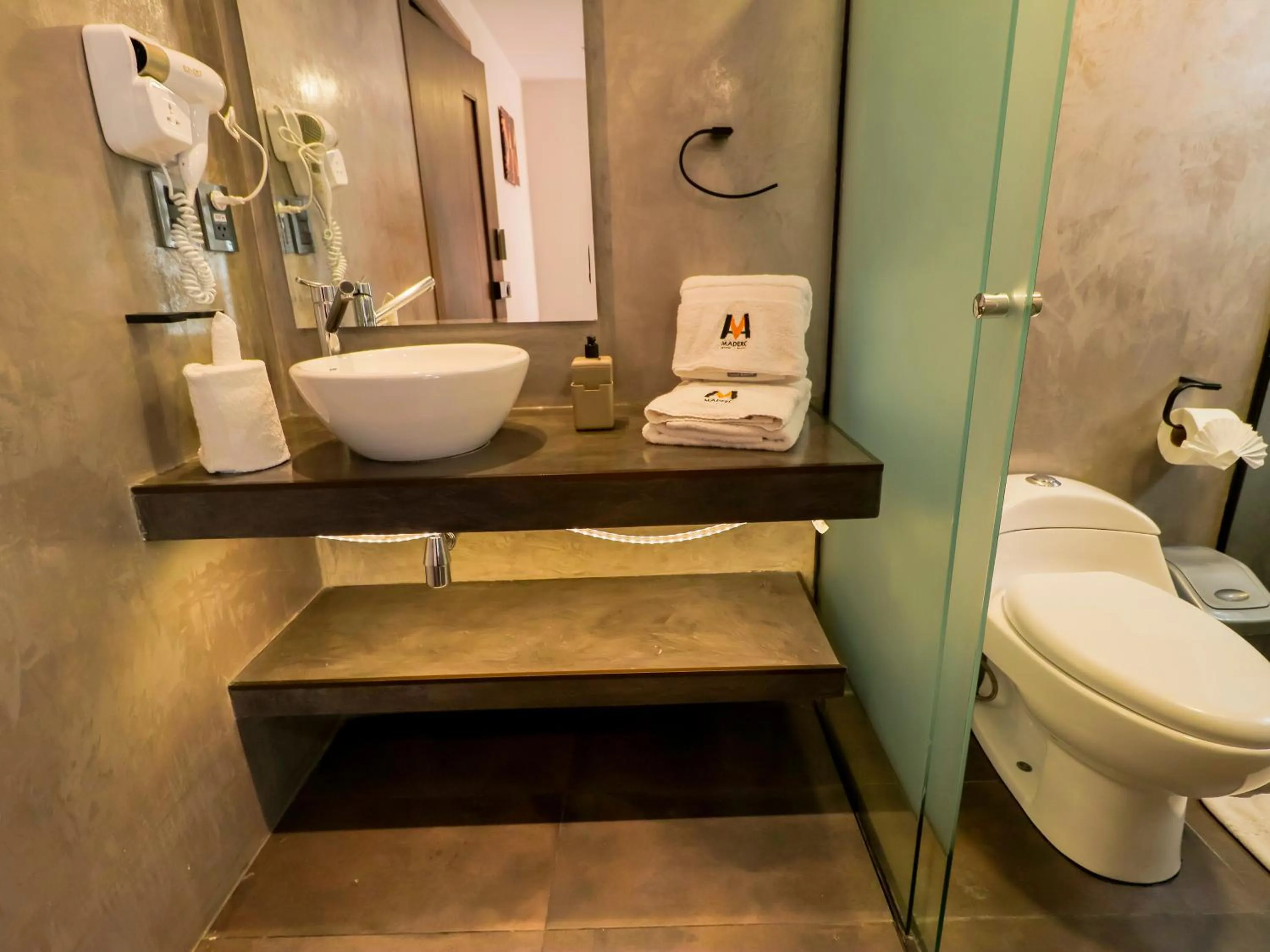 Toilet in Madero Hotel & Suites