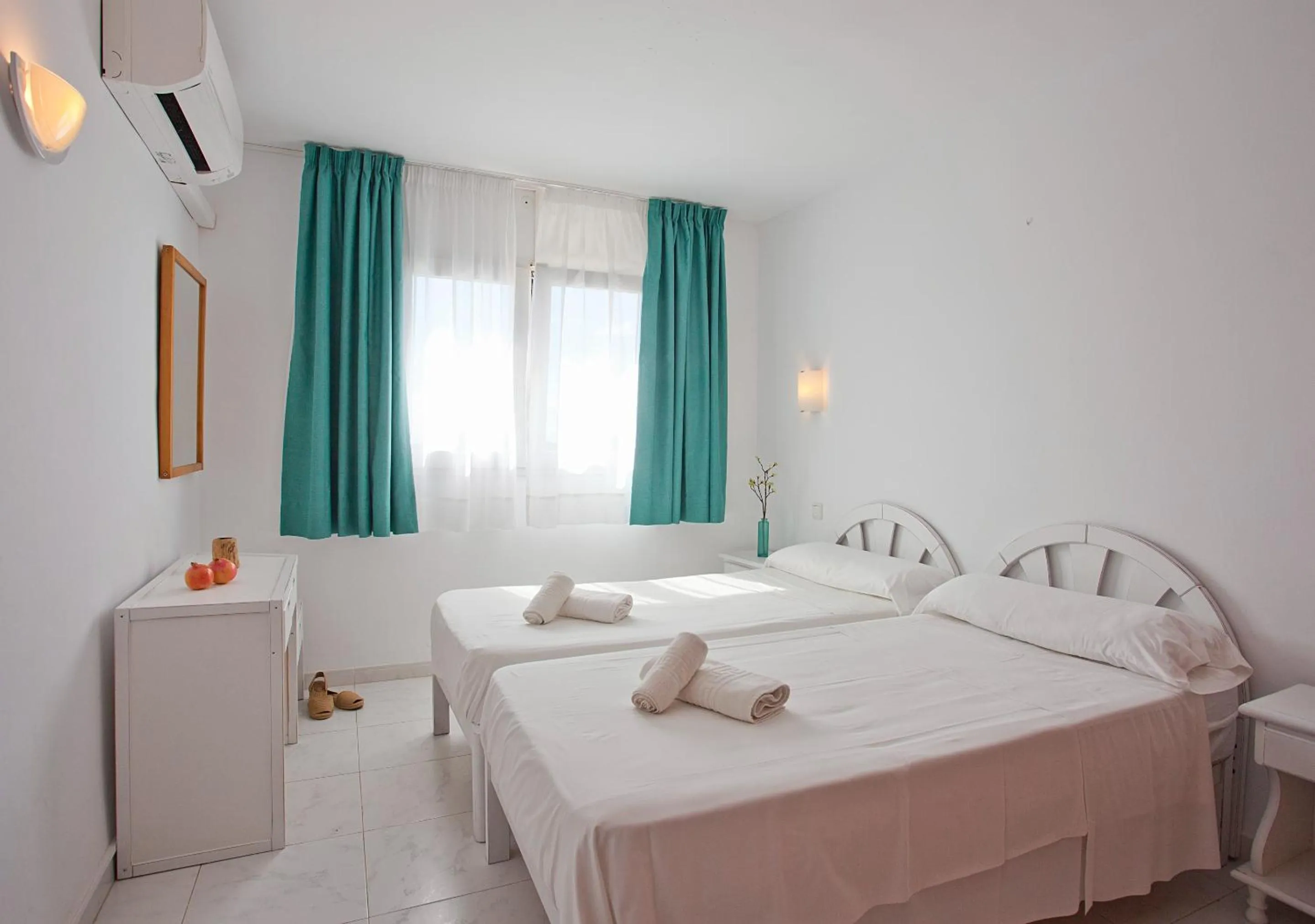 Bed in Apartamentos Sol Romántica by DOT Suites