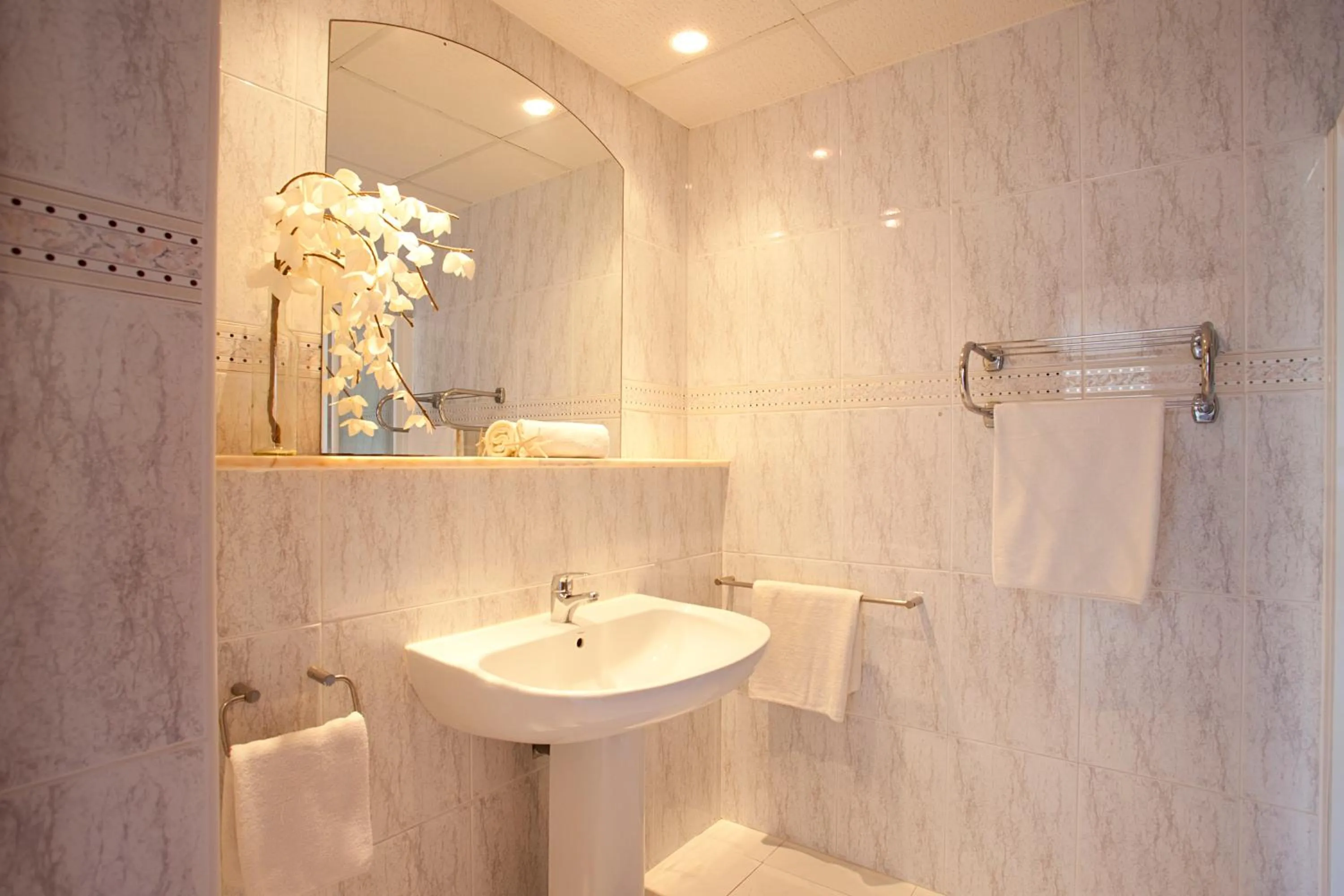 Bathroom in Apartamentos Sol Romántica by DOT Suites