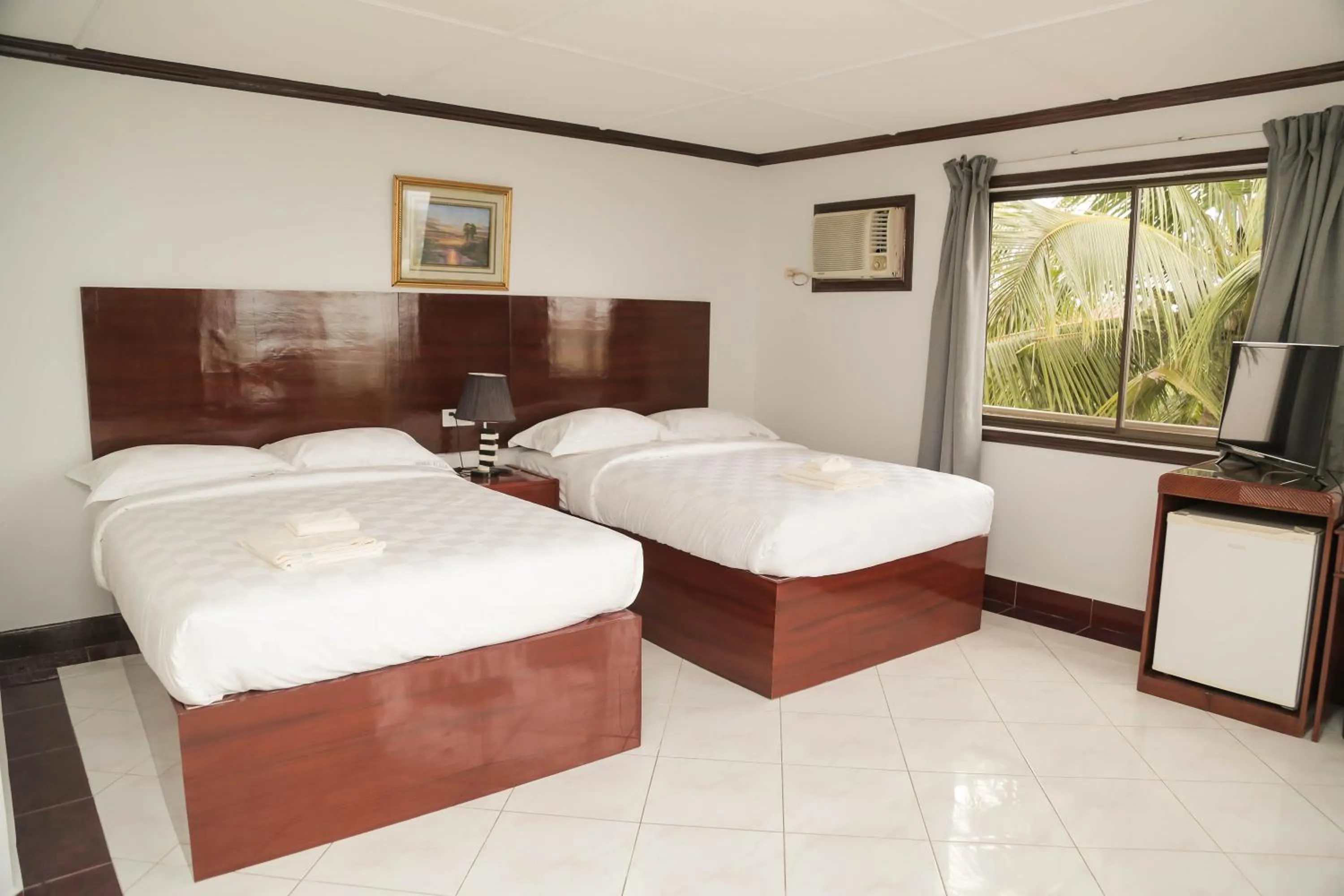 Bed in Bohol Plaza Mountain Resort and Restaurant