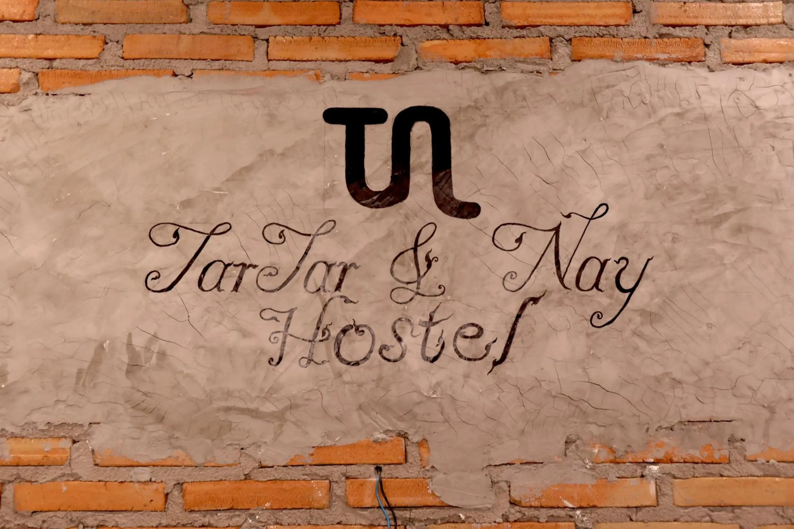 Property logo or sign in TarTar & Nay Hostel