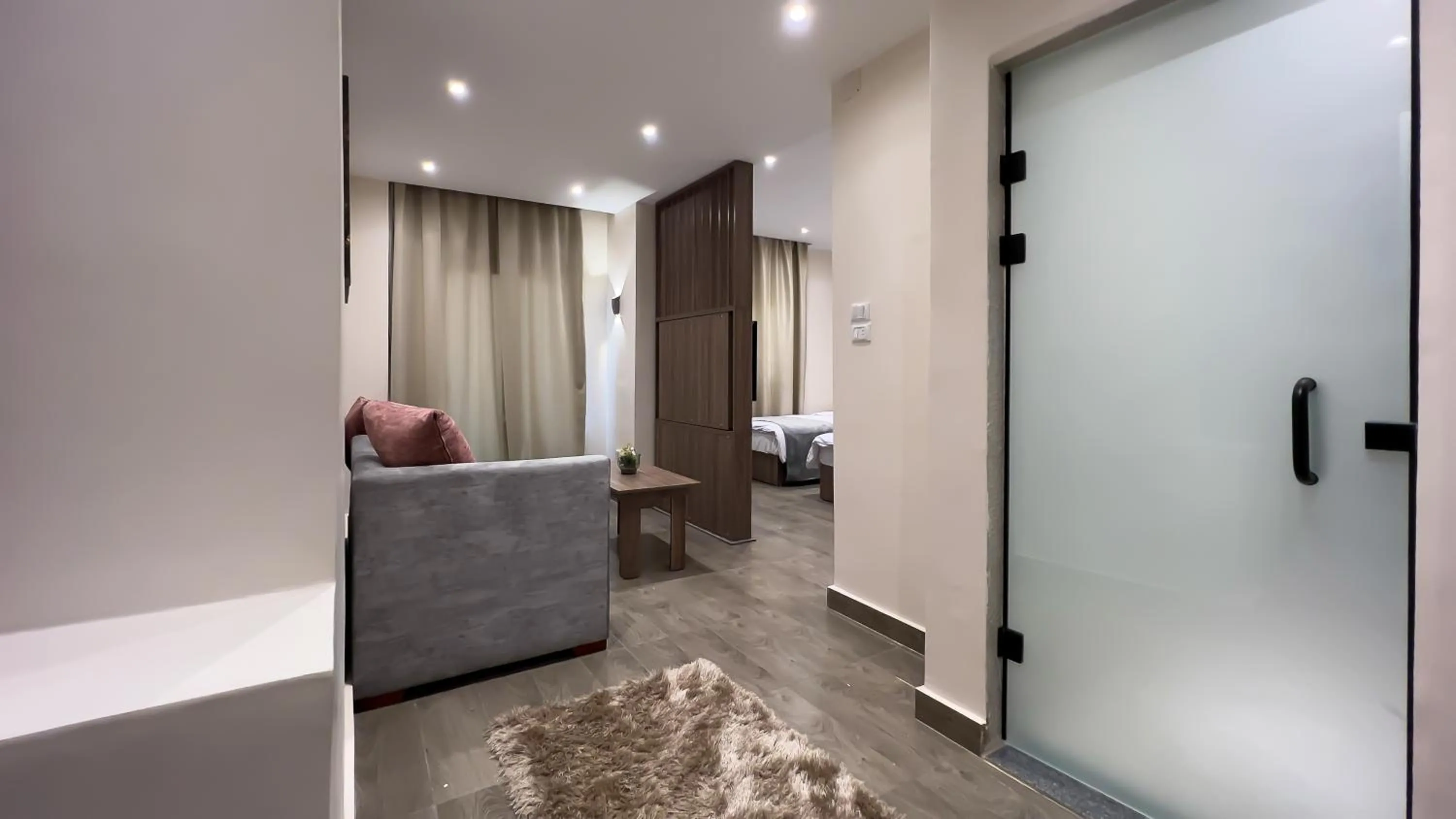 Seating area, Bed in STEPS IN Pyramids View