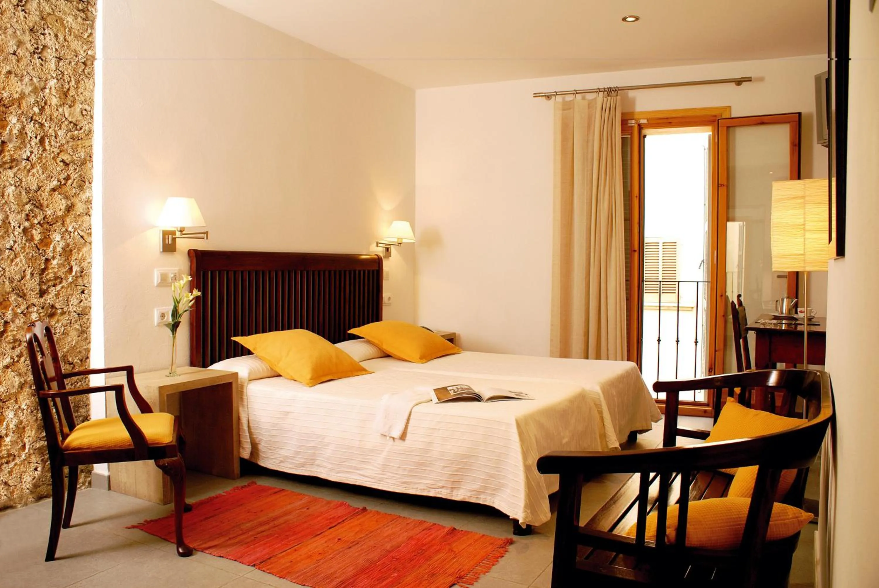 Photo of the whole room, Bed in L'Hostal Pollenca - Turisme Interior