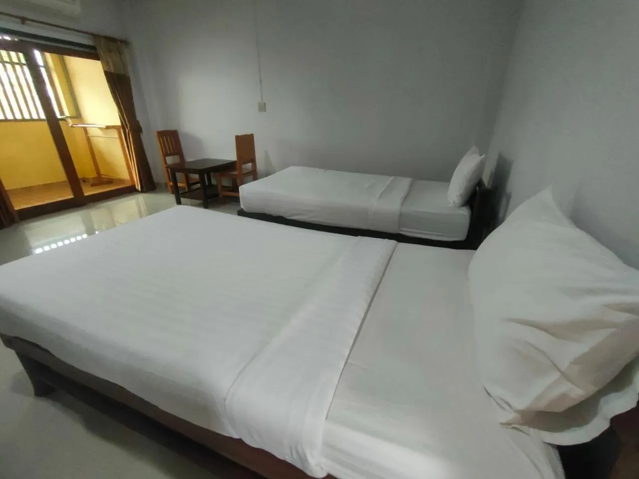 Bed in Chatchawan Resort