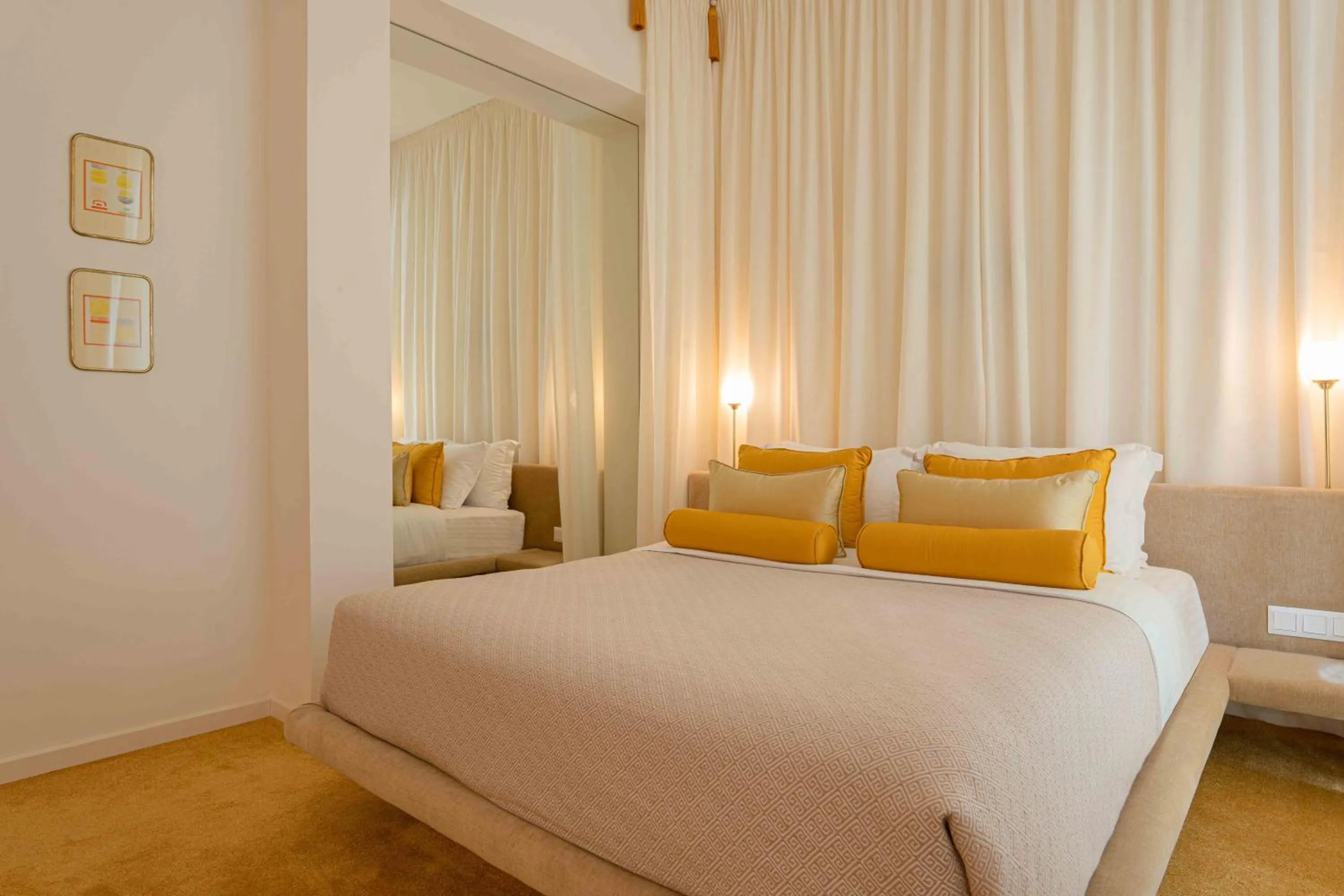 Bed in Apollo Palm Hotel