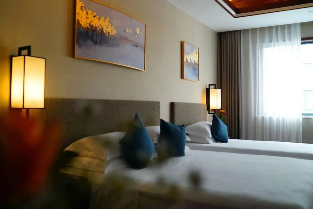 Bed in SSAW Boutique Hotel Shanghai Huangpu River
