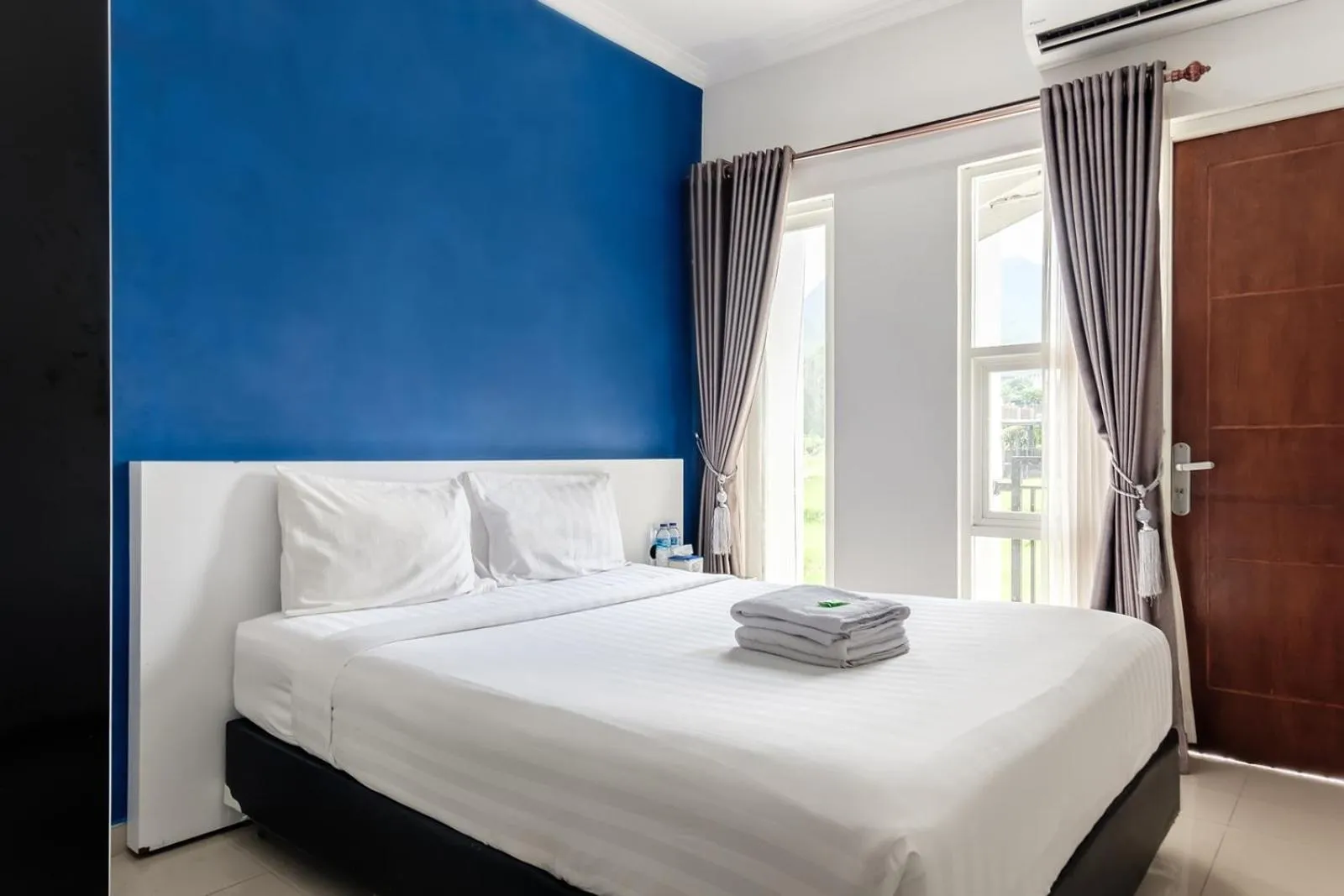 Bedroom, Bed in TwoSpaces Living at Panorama Villas