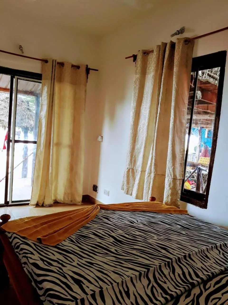 Bed in Sipano Beach Lodge Kiwengwa