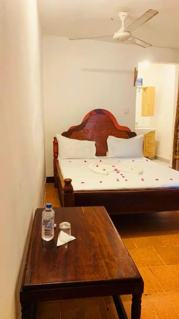 Bed in Sipano Beach Lodge Kiwengwa
