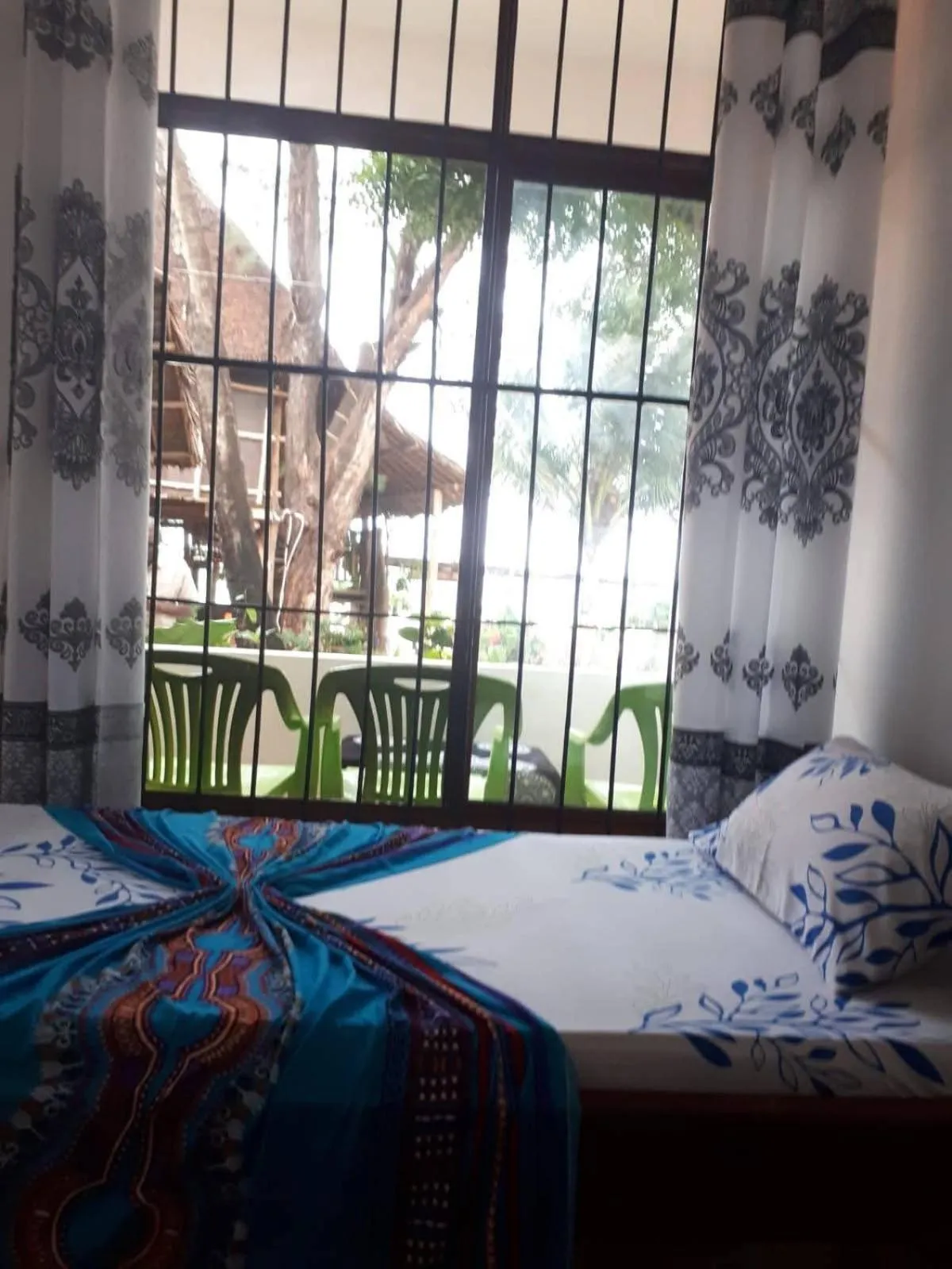 Bed in Sipano Beach Lodge Kiwengwa