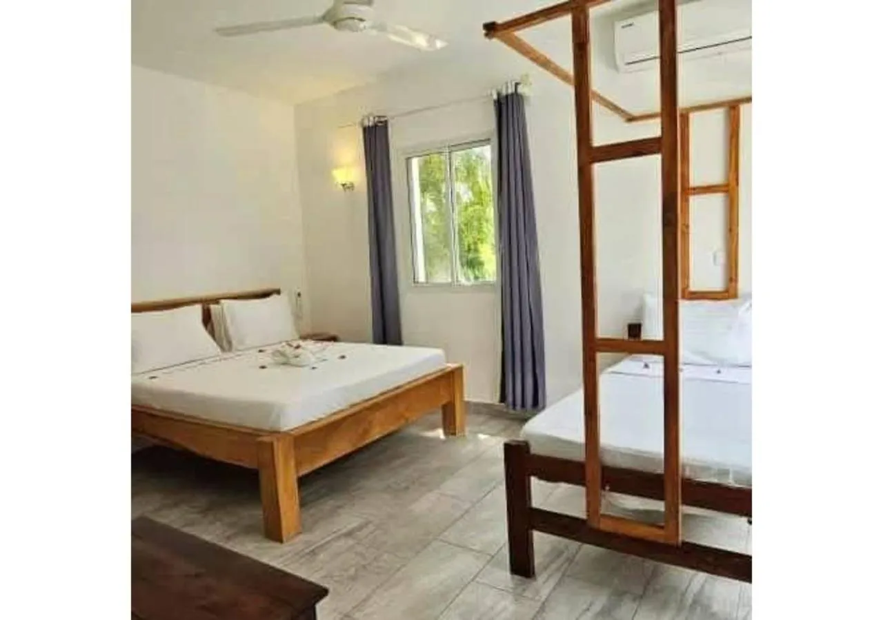 Bed in Sipano Beach Lodge Kiwengwa