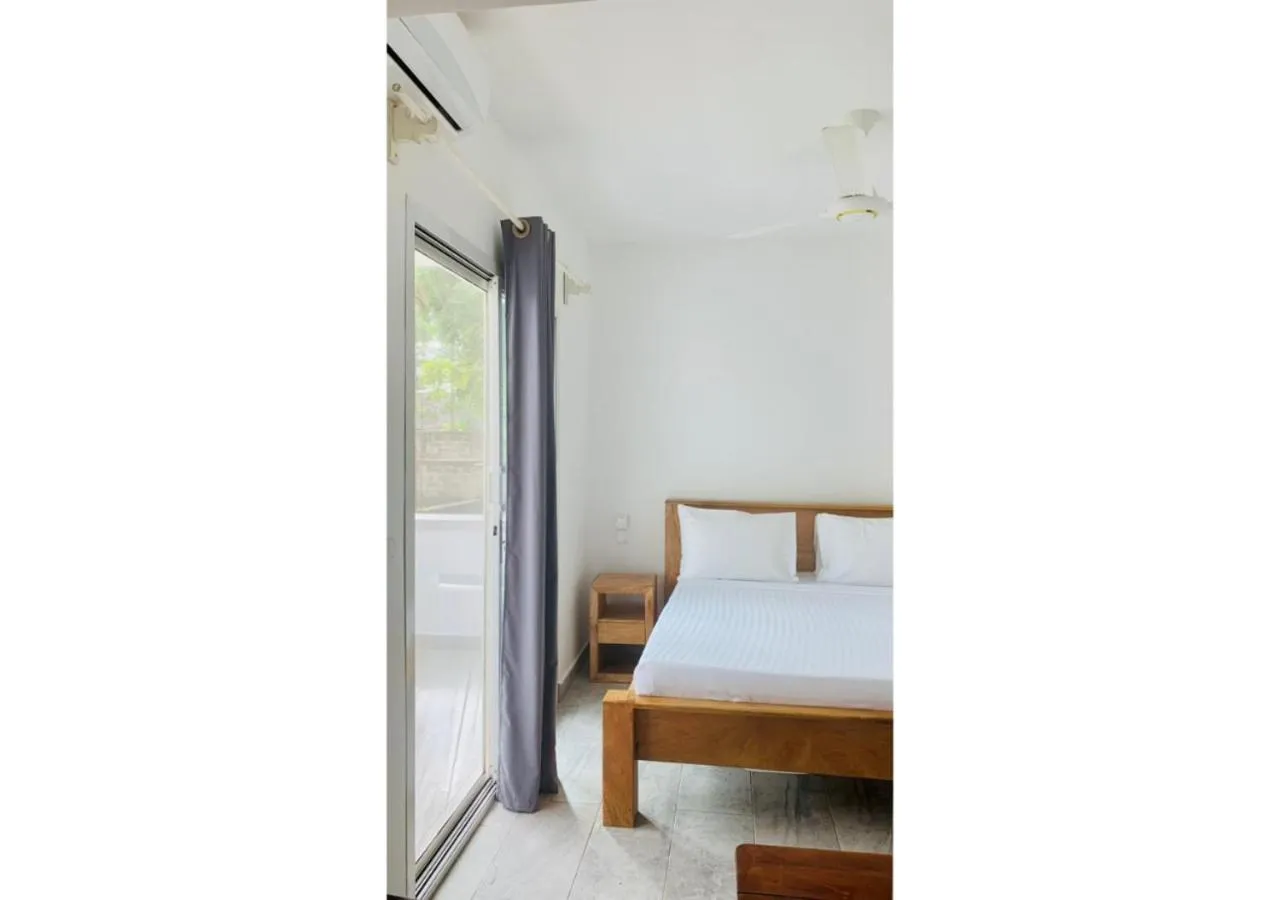 Bed in Sipano Beach Lodge Kiwengwa