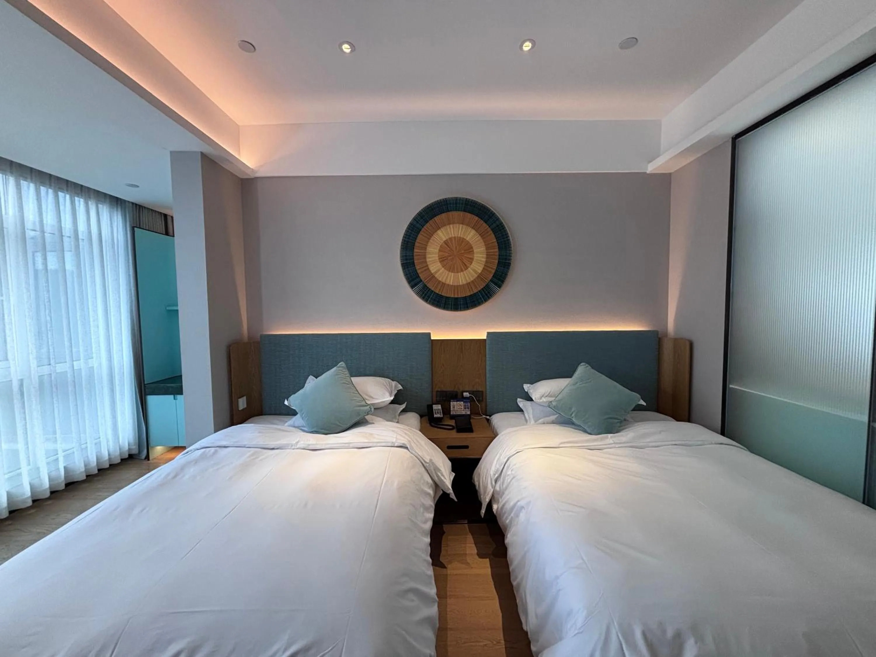 Bed in SSAW Boutique Hotel ZHIJIANG IMPRESSION