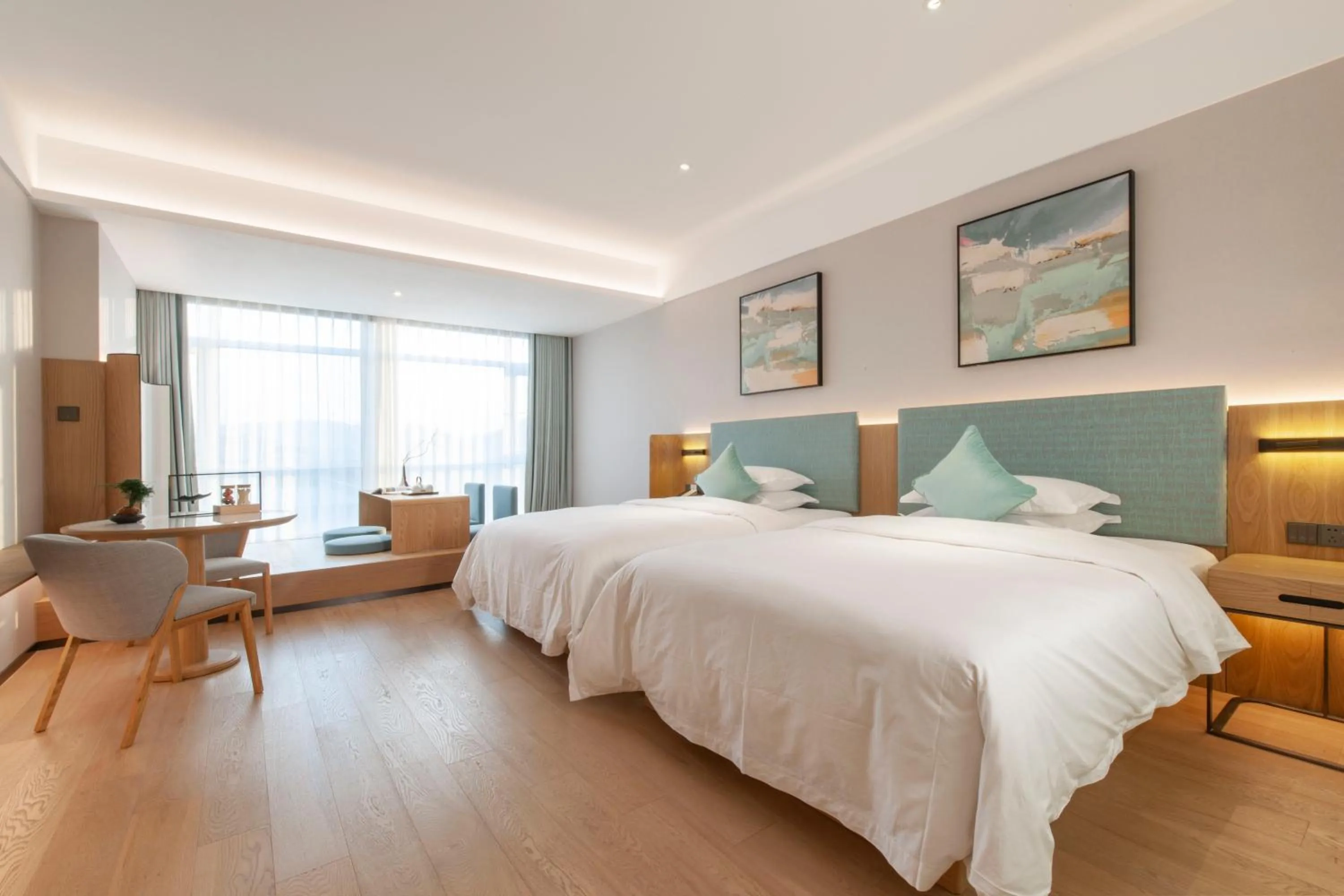 Photo of the whole room, Bed in SSAW Boutique Hotel ZHIJIANG IMPRESSION